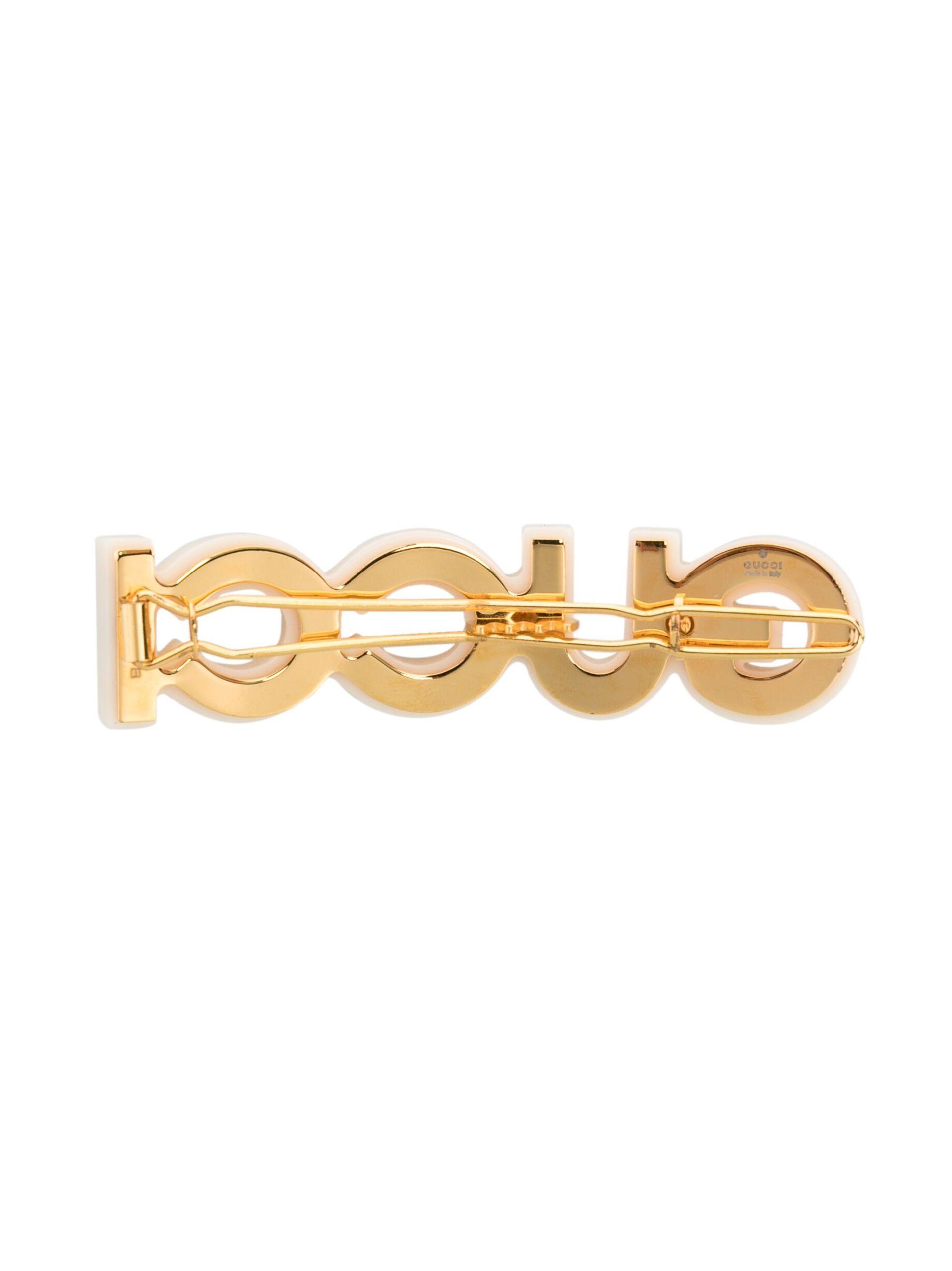 Gucci Script Brass Hair Clip In Gold,crystal