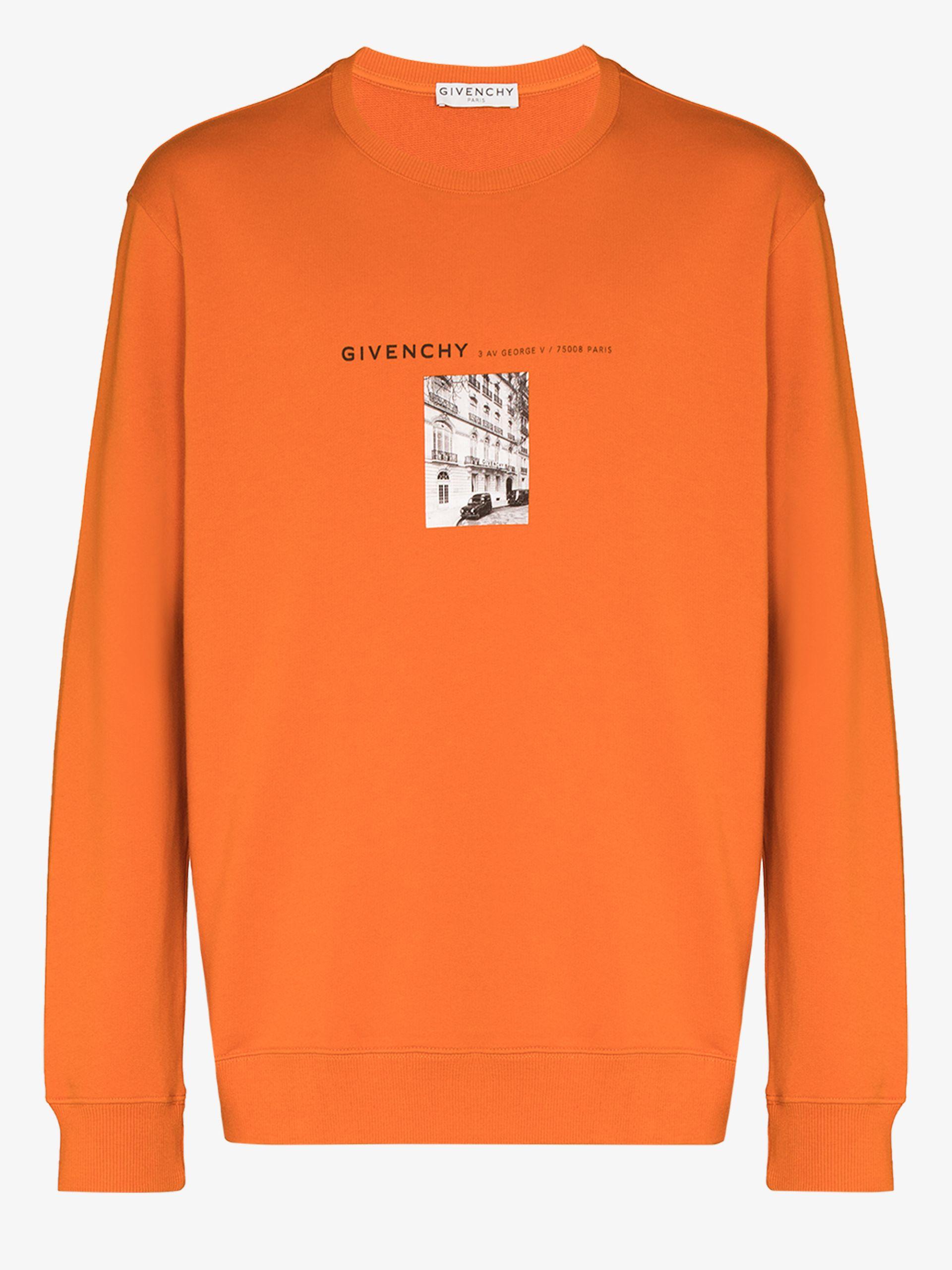 orange givenchy sweater