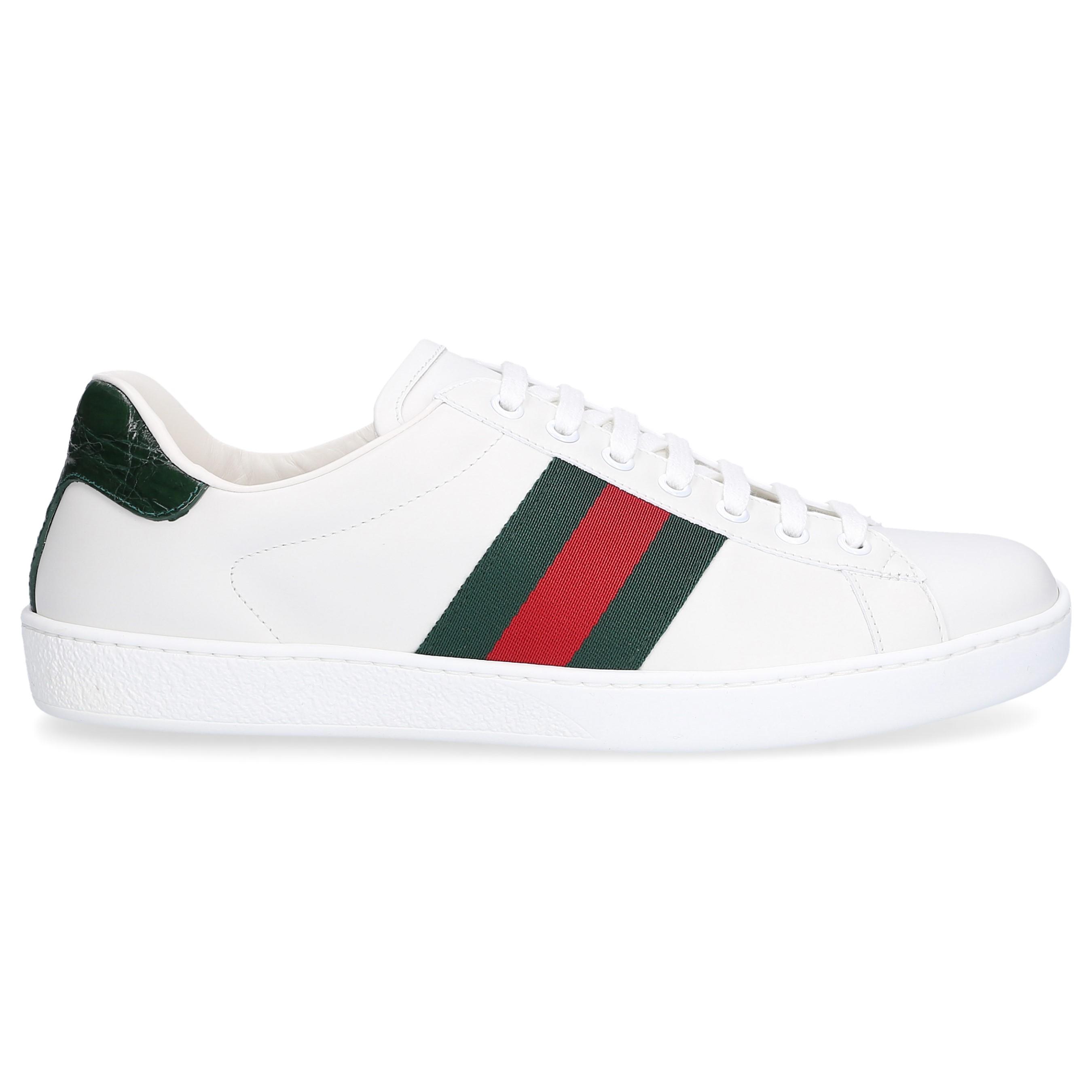 white sneakers with red and green stripes