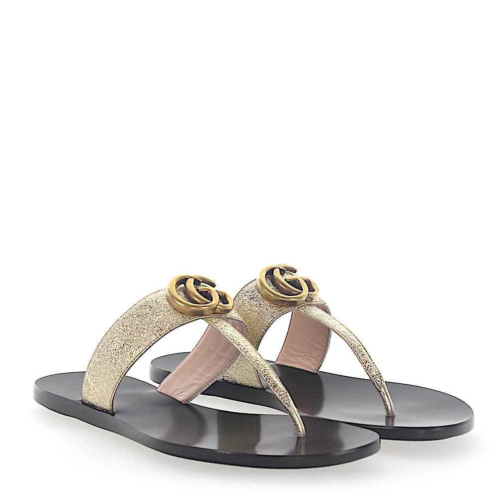 gucci gold flip flops
