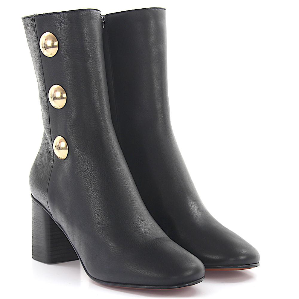 black boots with gold buttons