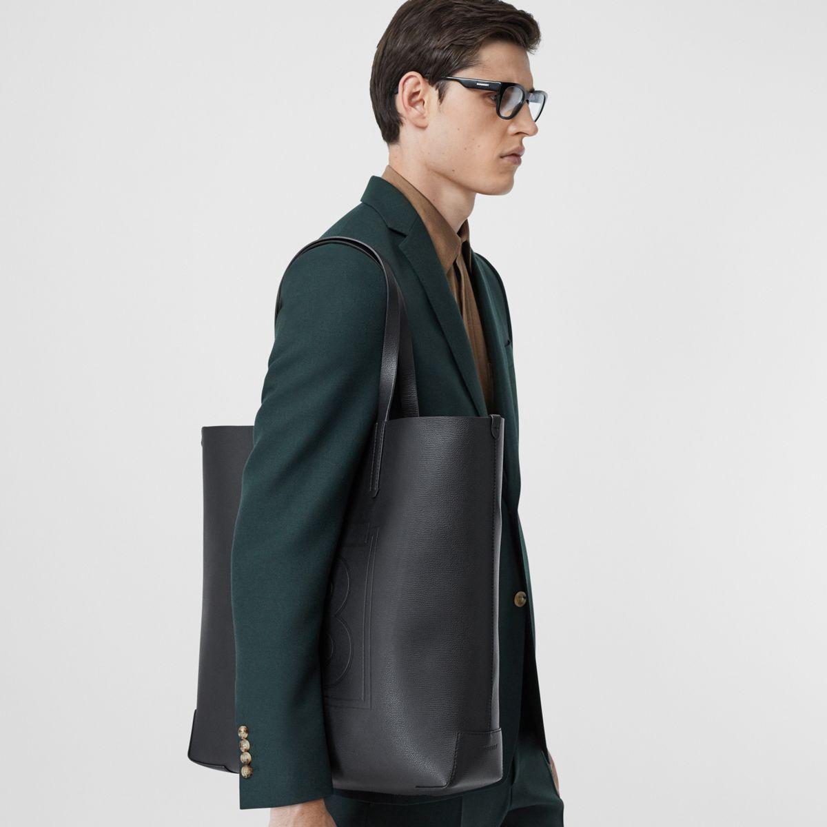 embossed monogram motif leather tote