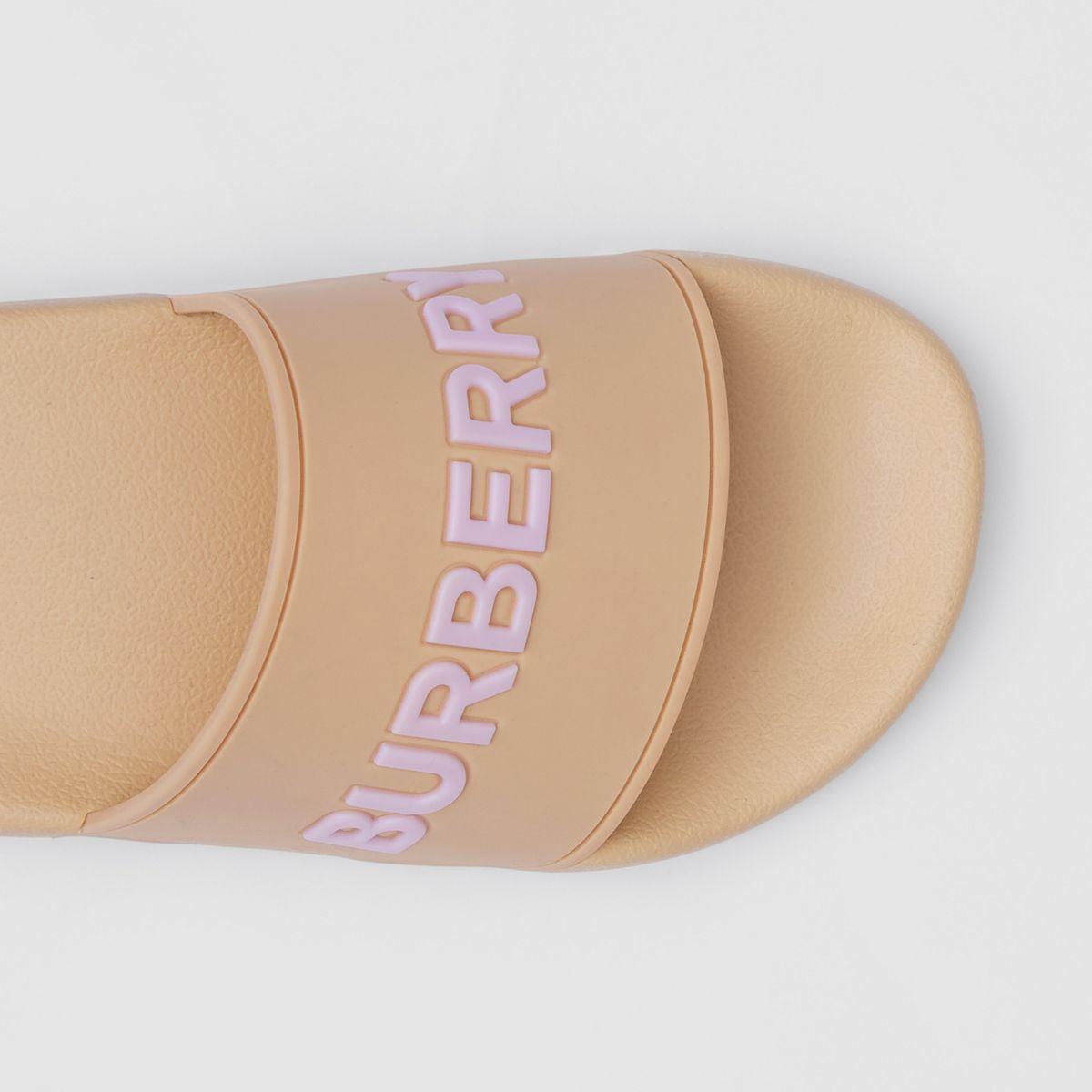 Burberry Embossed Logo Slides in Pink | Lyst