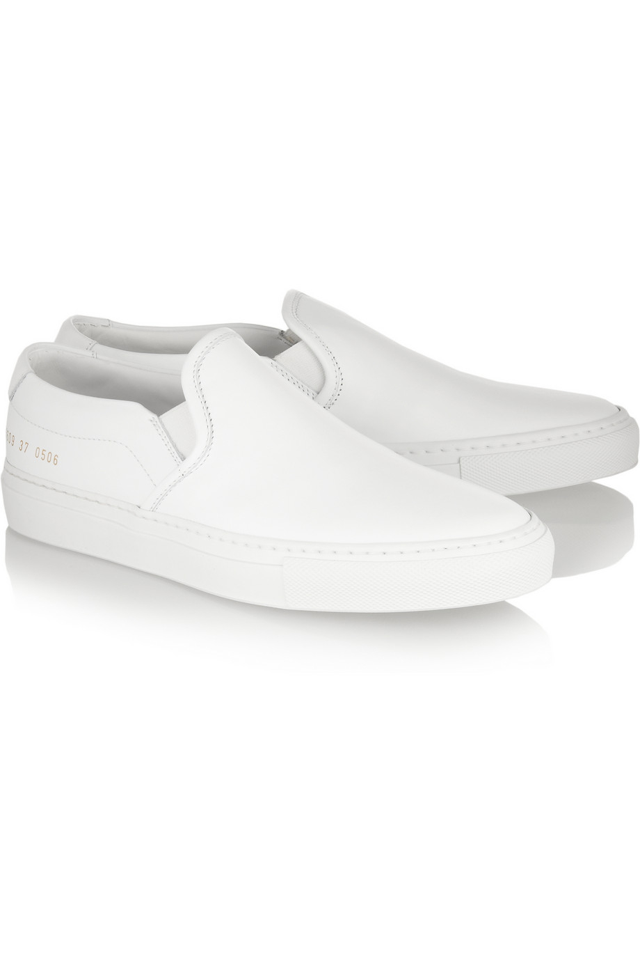white sneakers common projects