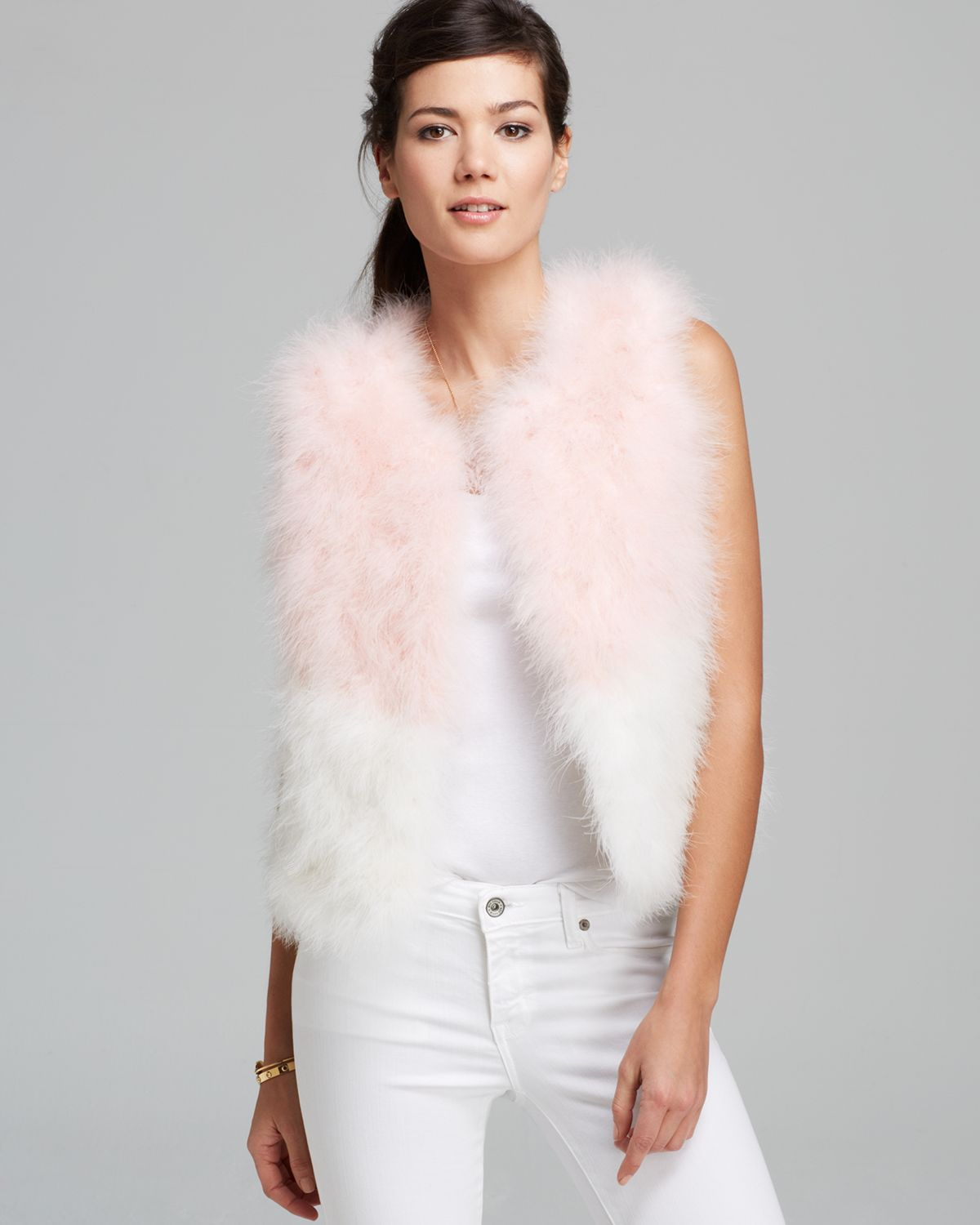 white feather vest