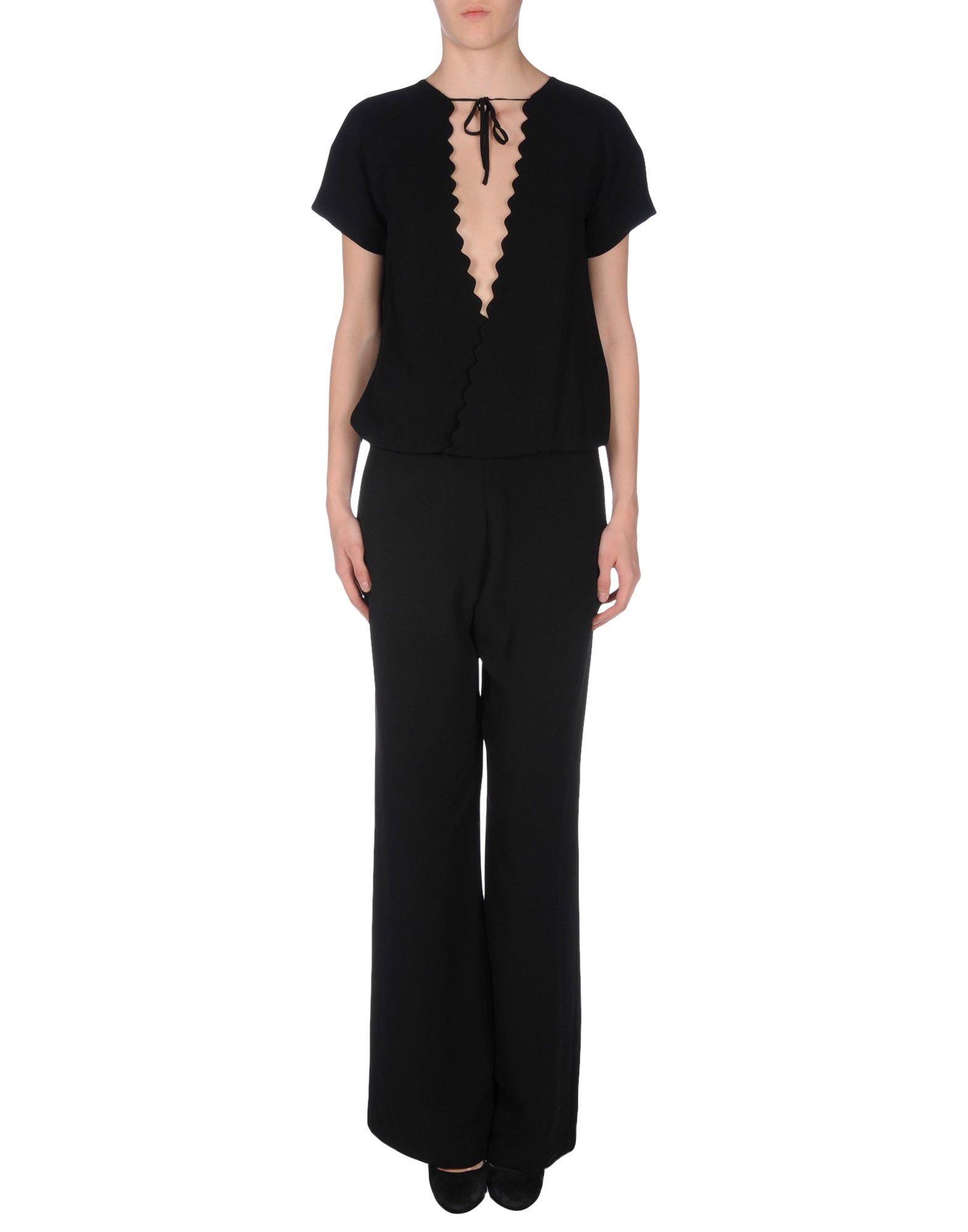 Shop by category The Details. Nude. loose fit trousers. Black cotton loose fit trousers from Nude featuring a waistband with belt loops, a button fastening, a straight leg and adjustable straps to turn the trousers into dungarees.