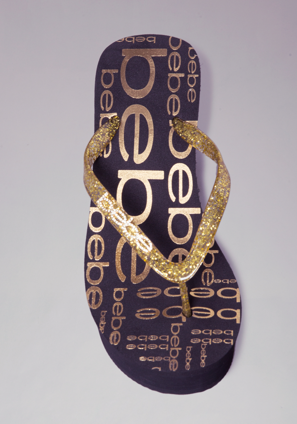 bebe gold flip flops