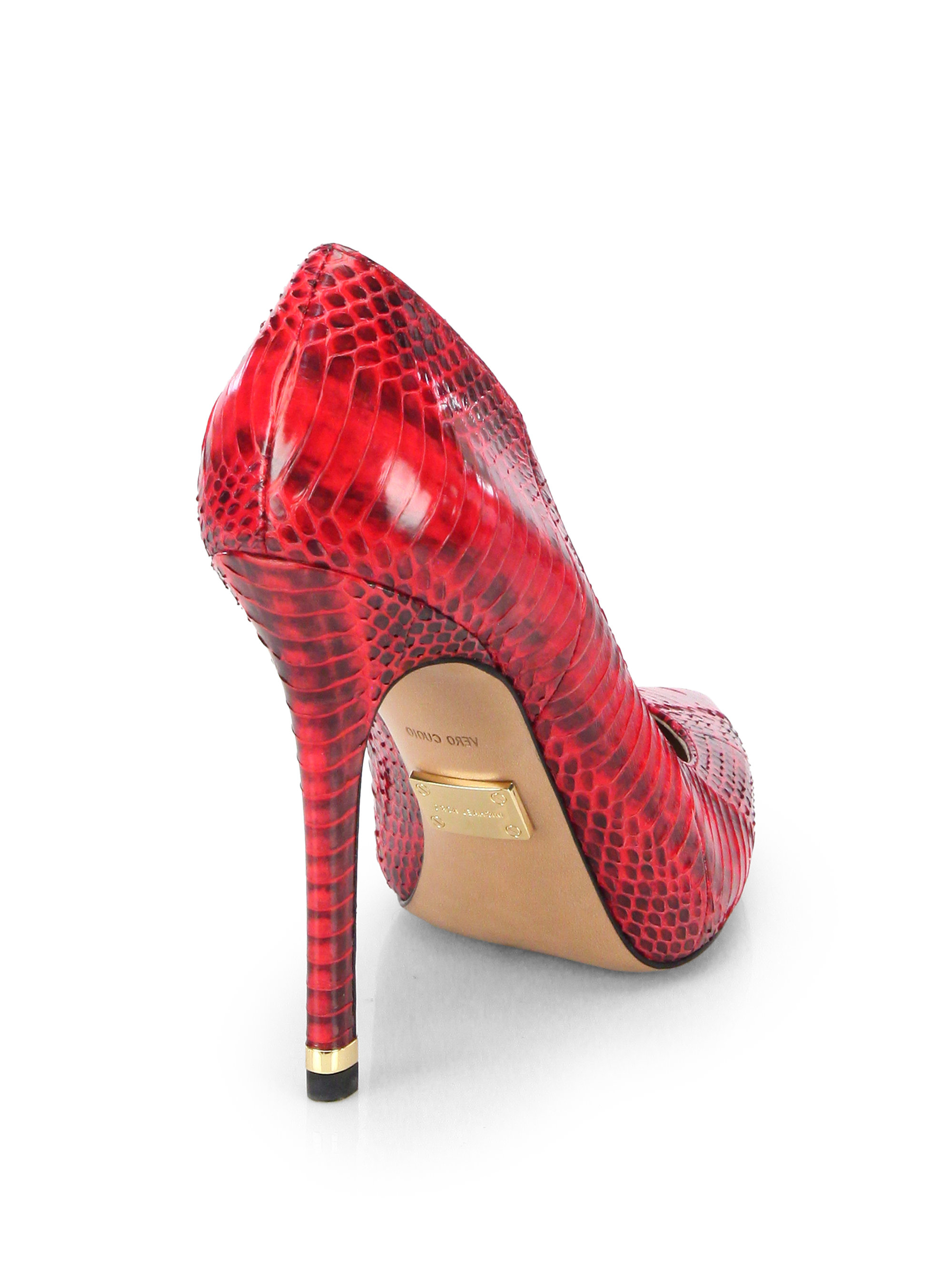 red snakeskin pumps