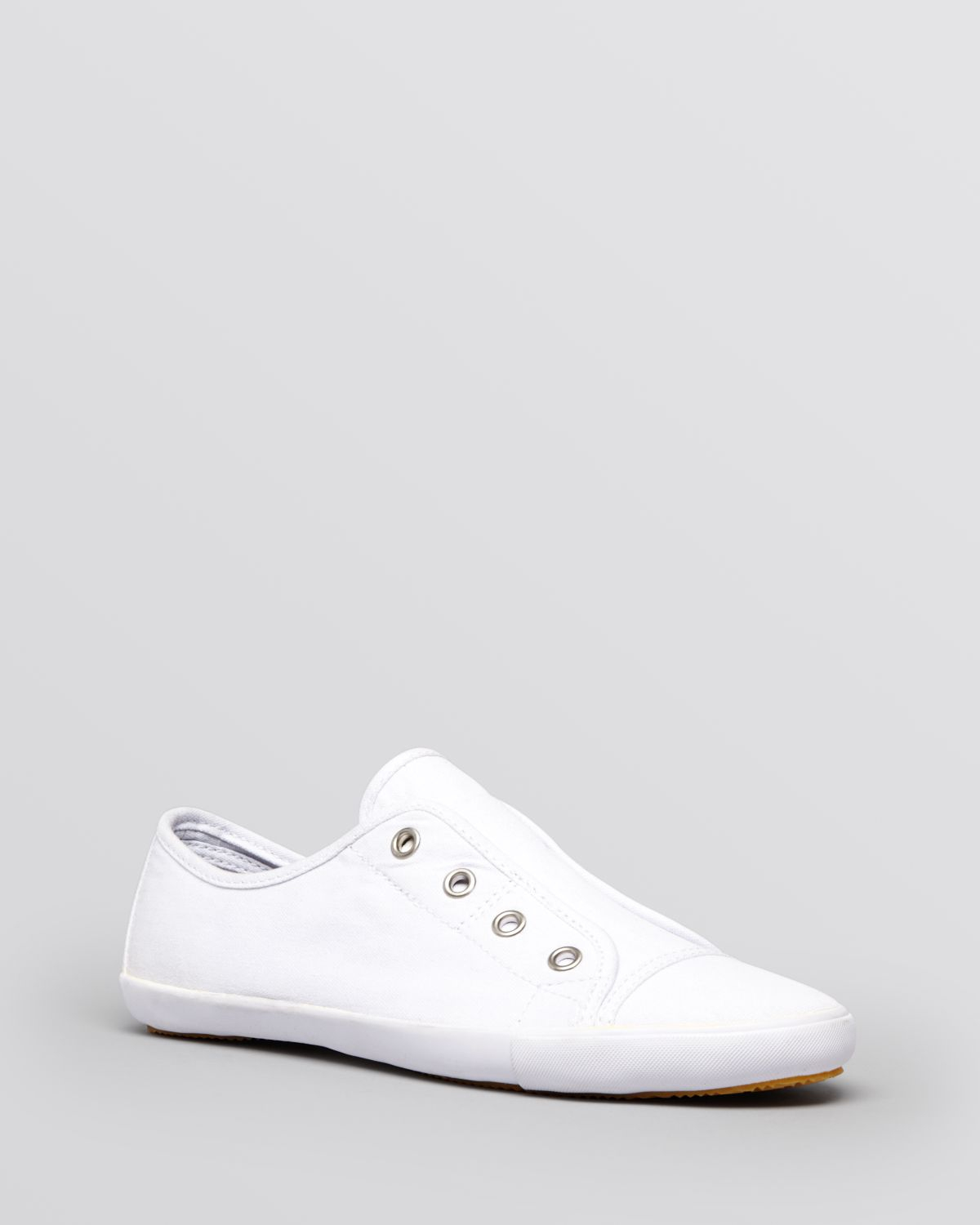 white flat sneakers