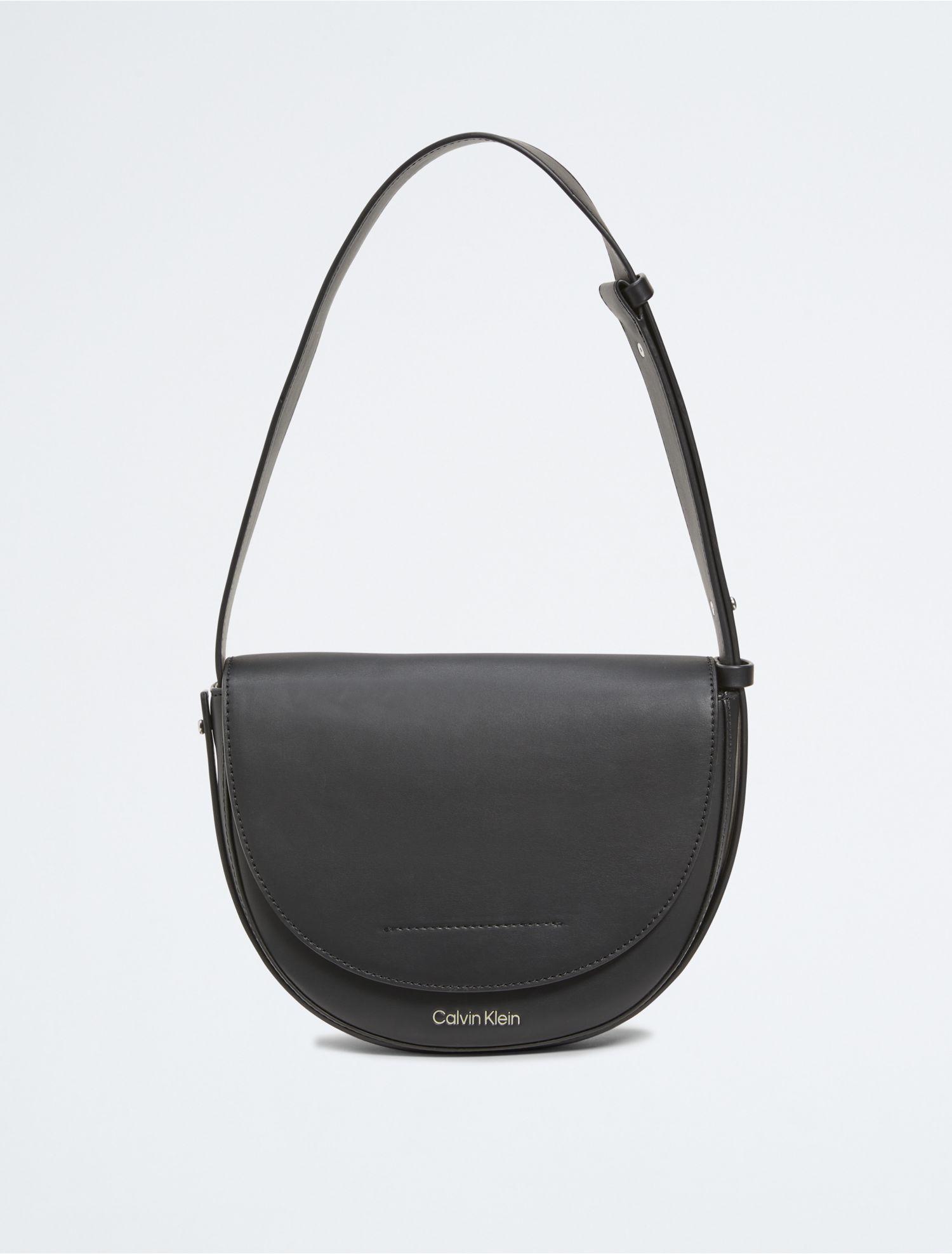 Calvin Klein Elemental Saddle Bag in Black | Lyst
