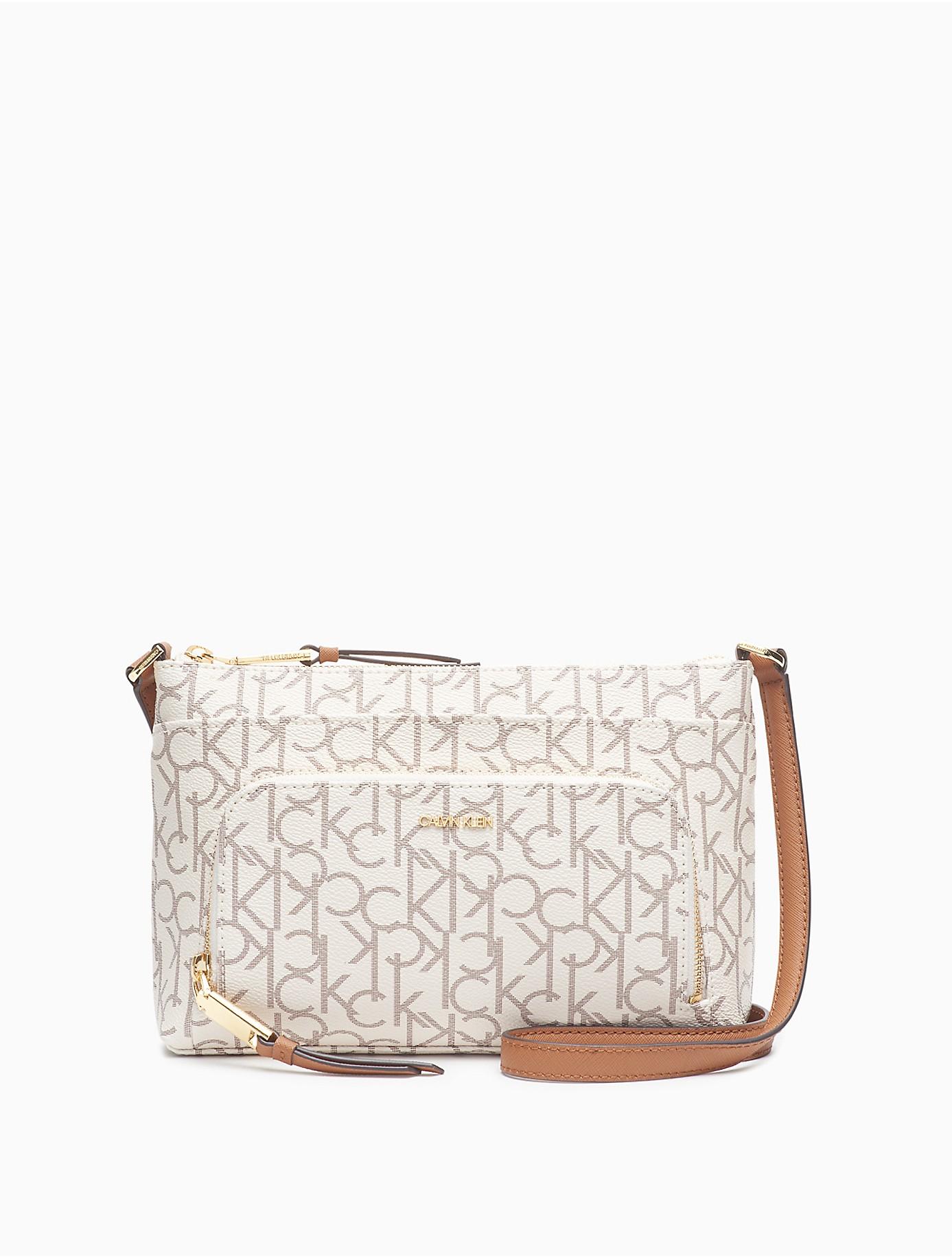 Calvin Klein Lily Monogram Logo Zip Crossbody Bag in Natural