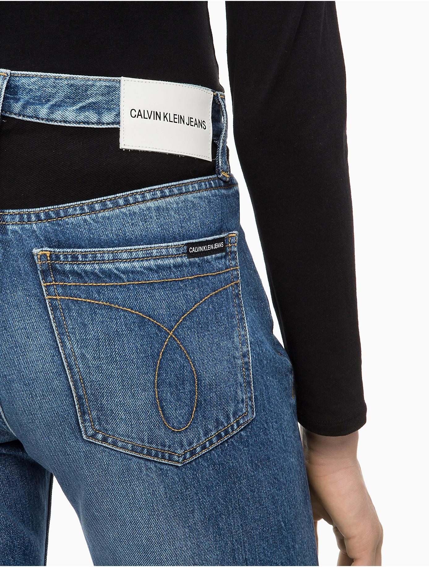 ckj 030 high rise straight patched jeans