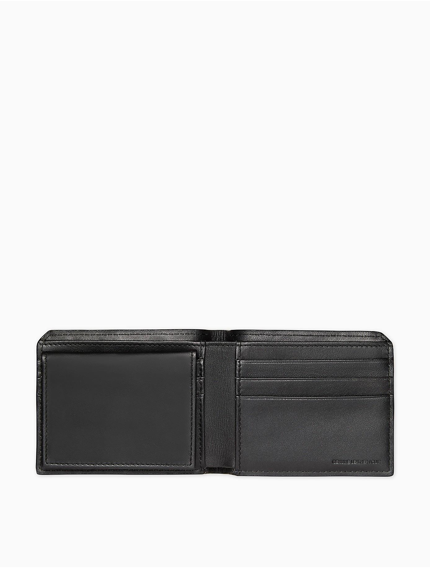 Calvin Klein Leather Embossed Monogram Logo Bifold Wallet in Navy (Blue