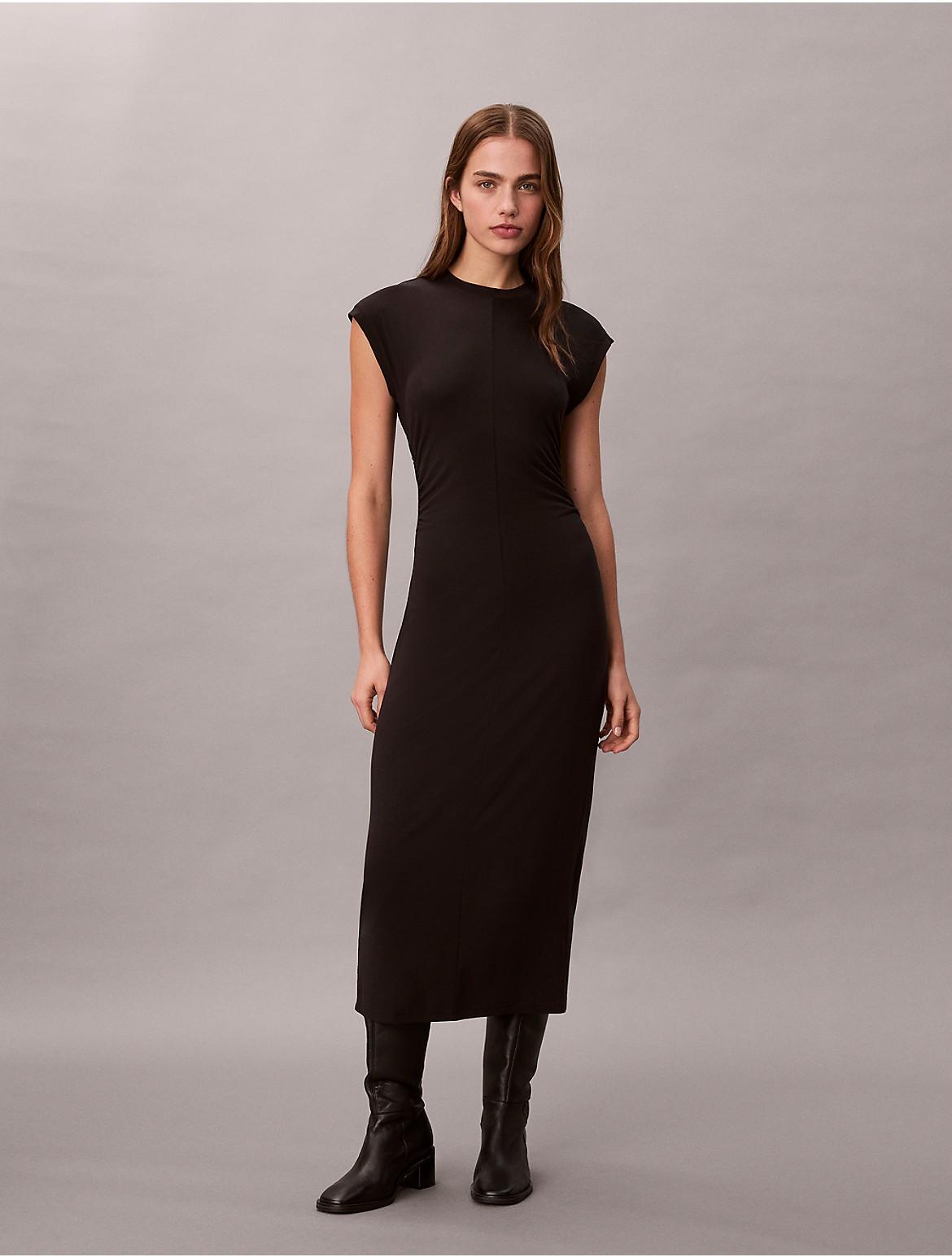 calvin klein evening dresses Sara Draped Dress Sequined illusion sleeves elevate a classic Calvin Klein gown that opens in an alluring V at the back. Calvin Klein evening gown dress
