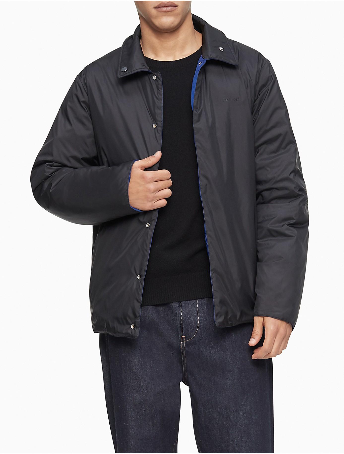 coach black quilted jacket