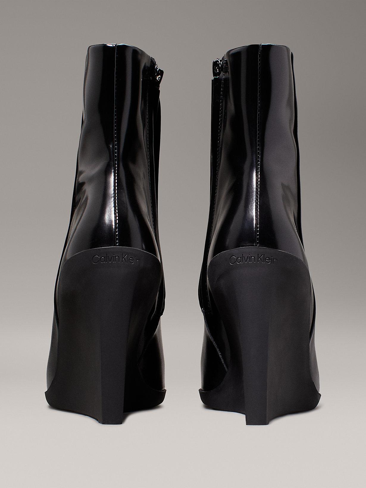 Calvin klein wedge boots sales