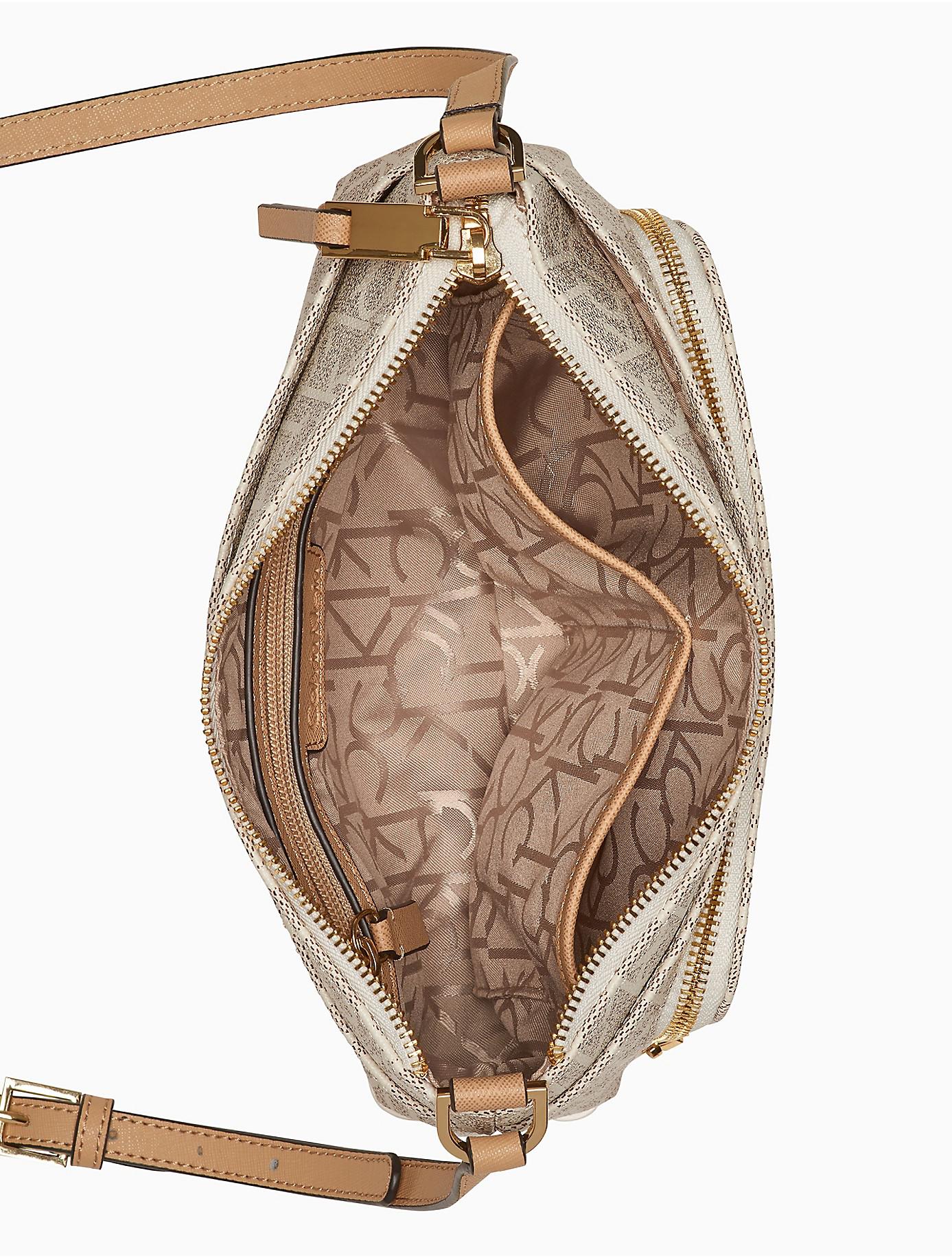 Calvin Klein Monogram Zip Crossbody Bag in Natural | Lyst