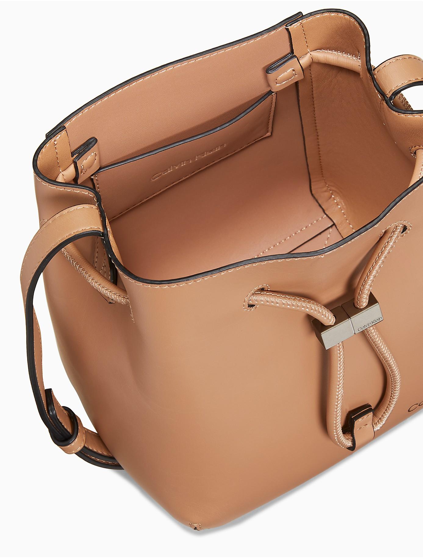 Calvin Klein Kaitlyn Faux Leather Crossbody Bag in Natural