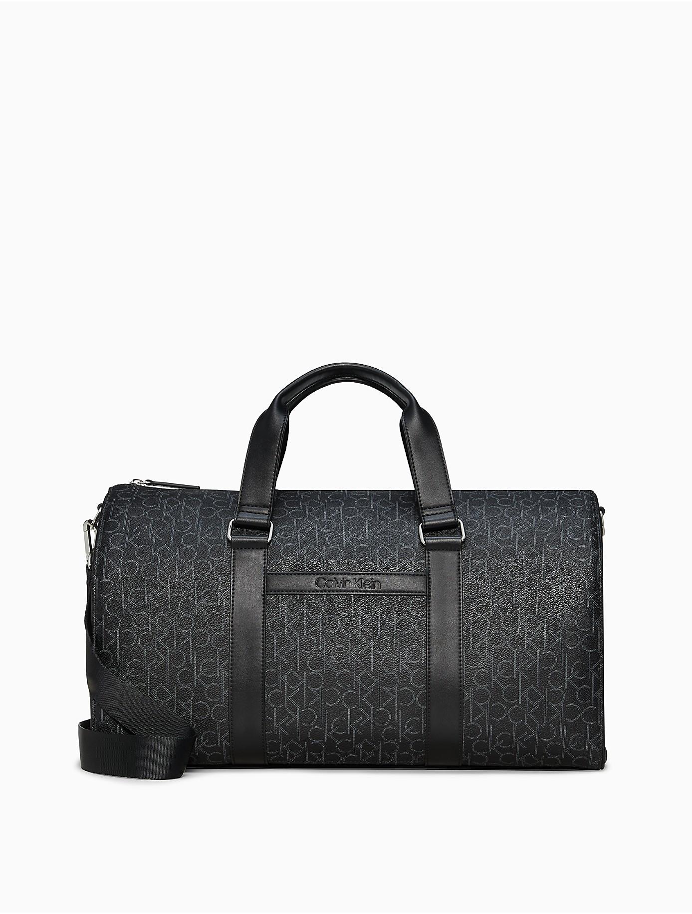 Mens Bags Duffel bags and weekend bags Calvin Klein Minimalism Logo-plaque Holdall in Black for Men 