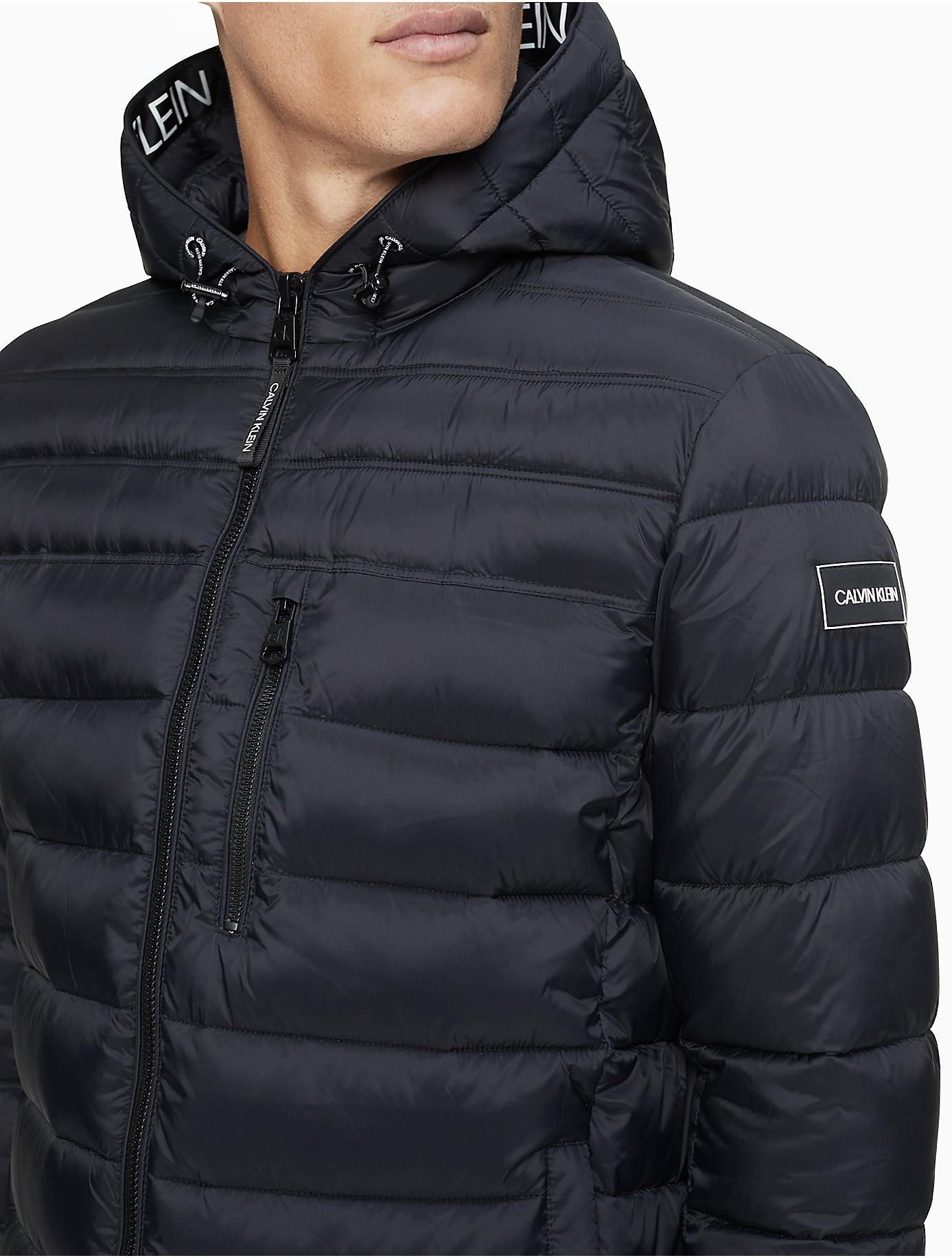 أحد عشر صورة قوة  Calvin Klein Synthetic Packable Logo Hooded Puffer Jacket in Black for Men  | Lyst