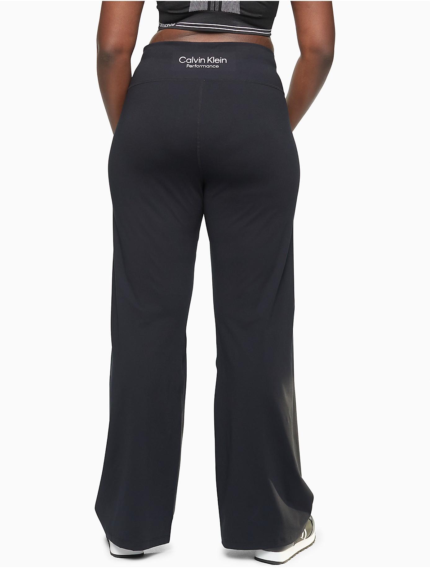 Calvin Klein Plus Size Performance Embrace High Waist Flared Pants in Black