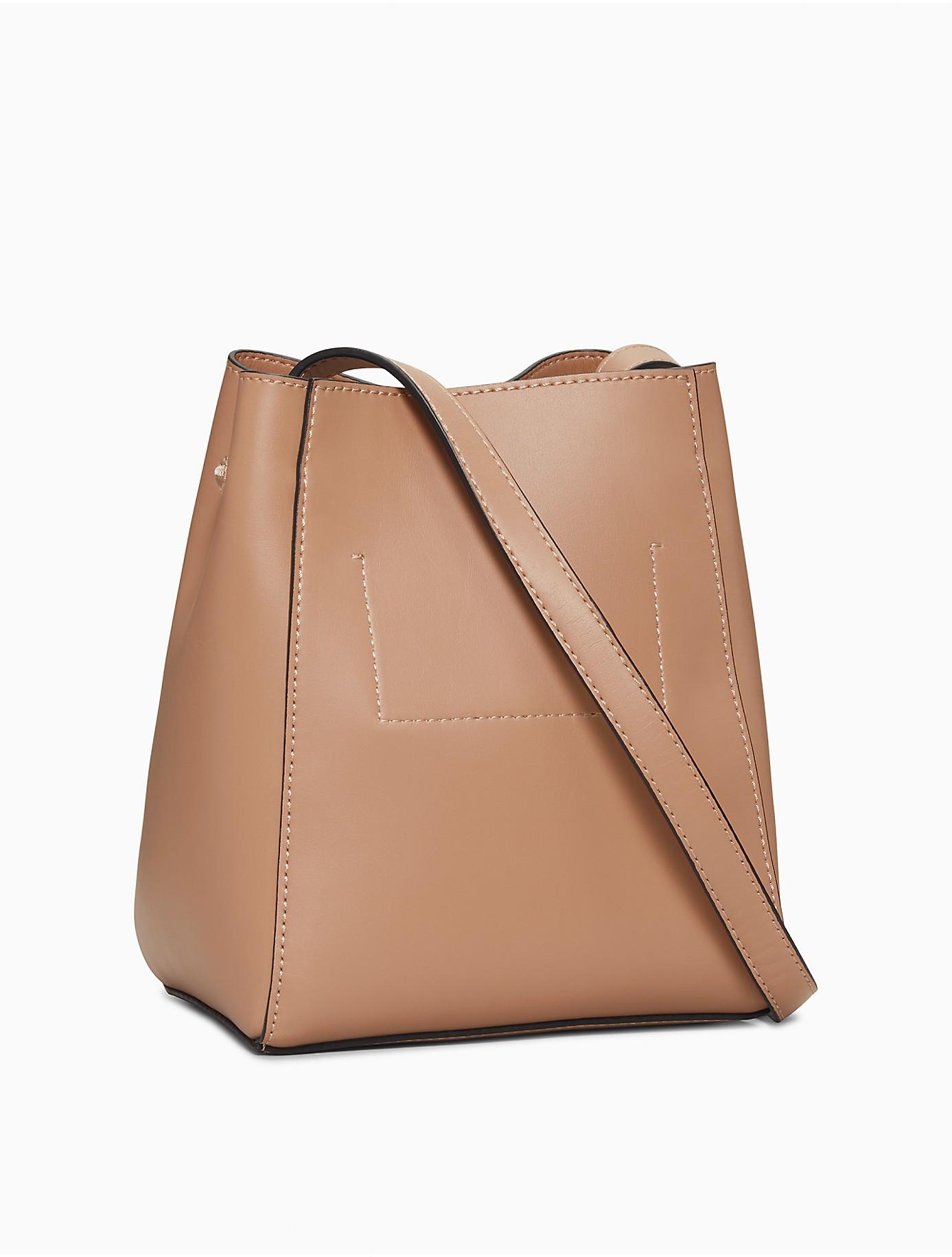 Calvin Klein Smooth Faux Leather Bucket Bag in Brown Lyst