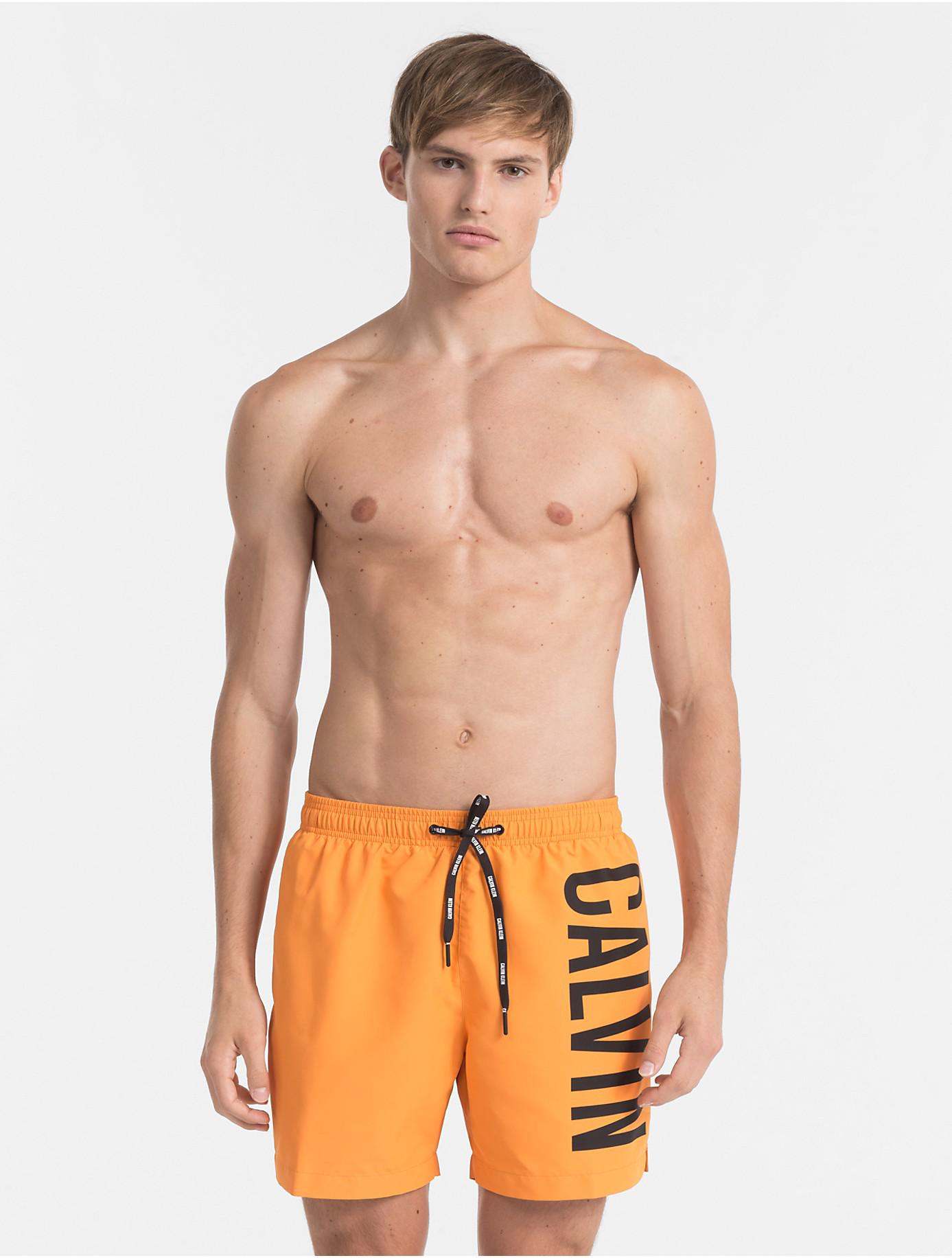 orange calvin klein swim shorts