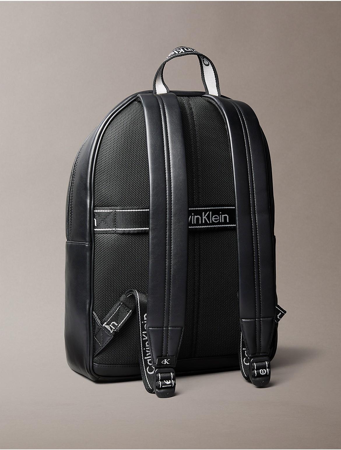 cole haan ivy pic stitch collection leather backpack Alexandria Small Flap color:DEER WOODLAND DARK SEA (07270) through trolley pocket and AFP26 original vs. fake kanken