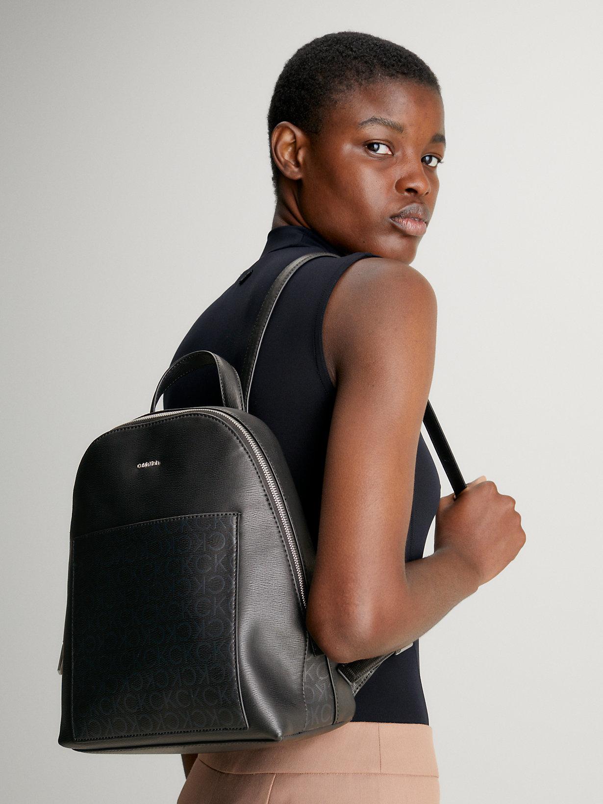 Calvin Klein Logo Round Backpack Bag in Black Lyst UK