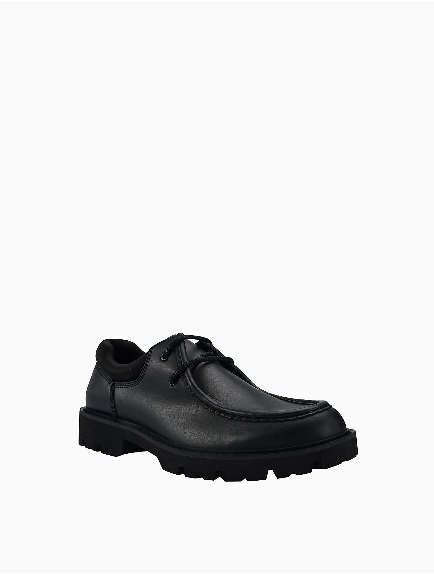 Calvin klein cheap rubber sole boots