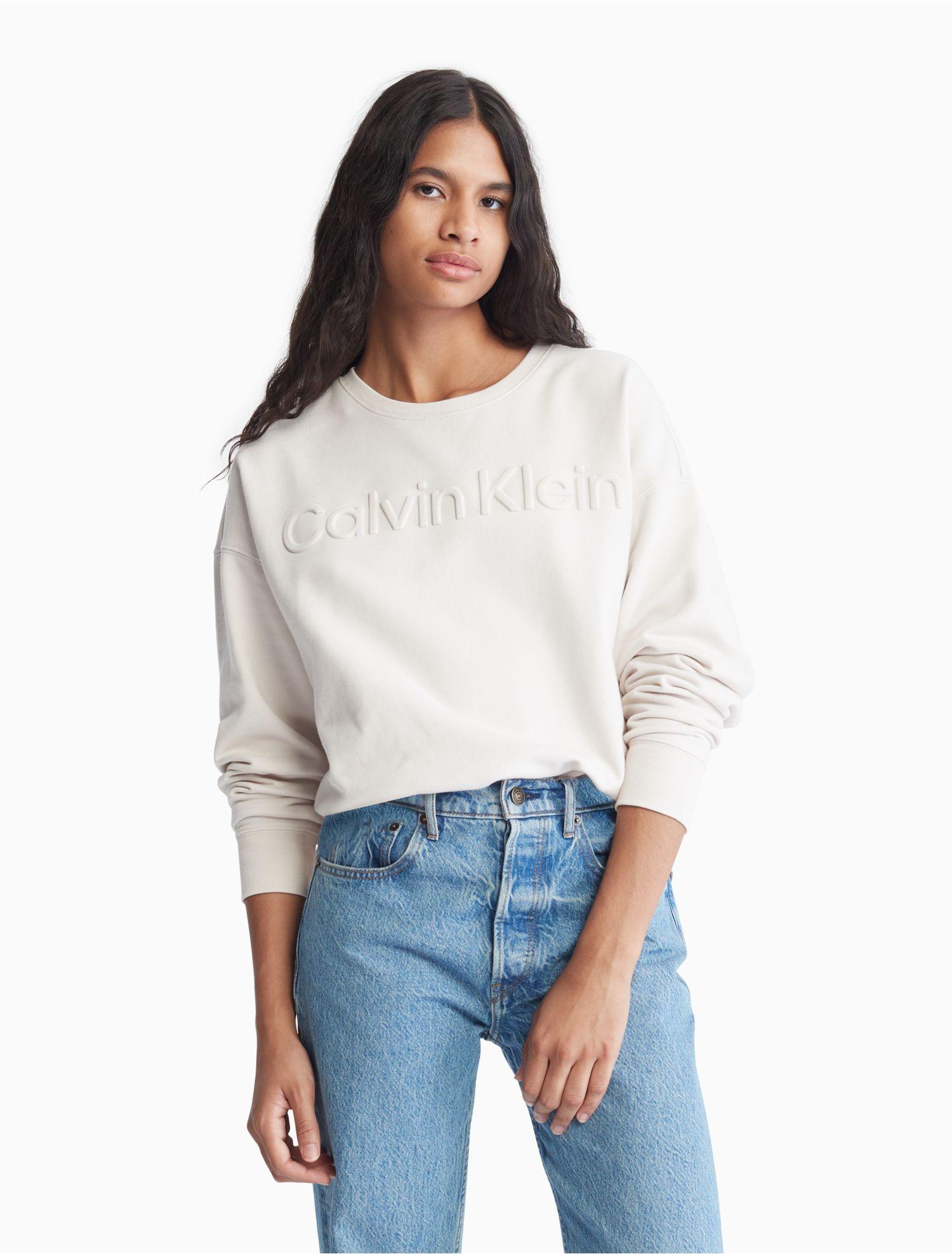 Calvin Klein Oversized Embossed Logo Crewneck Sweatshirt in White | Lyst