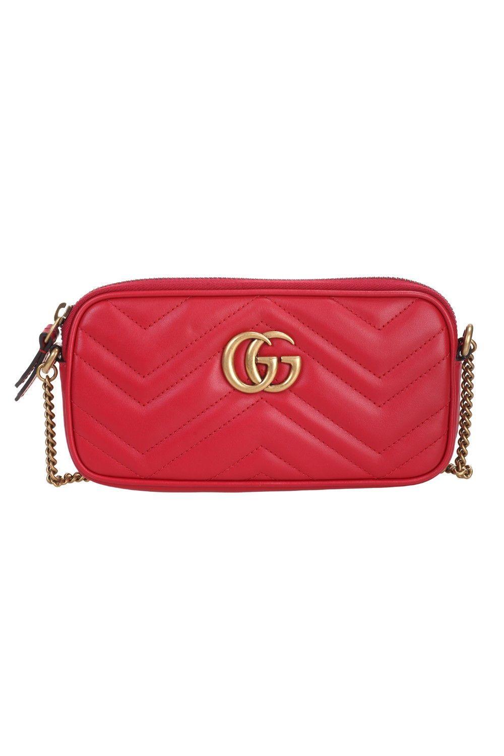 white gucci purse with heart on back