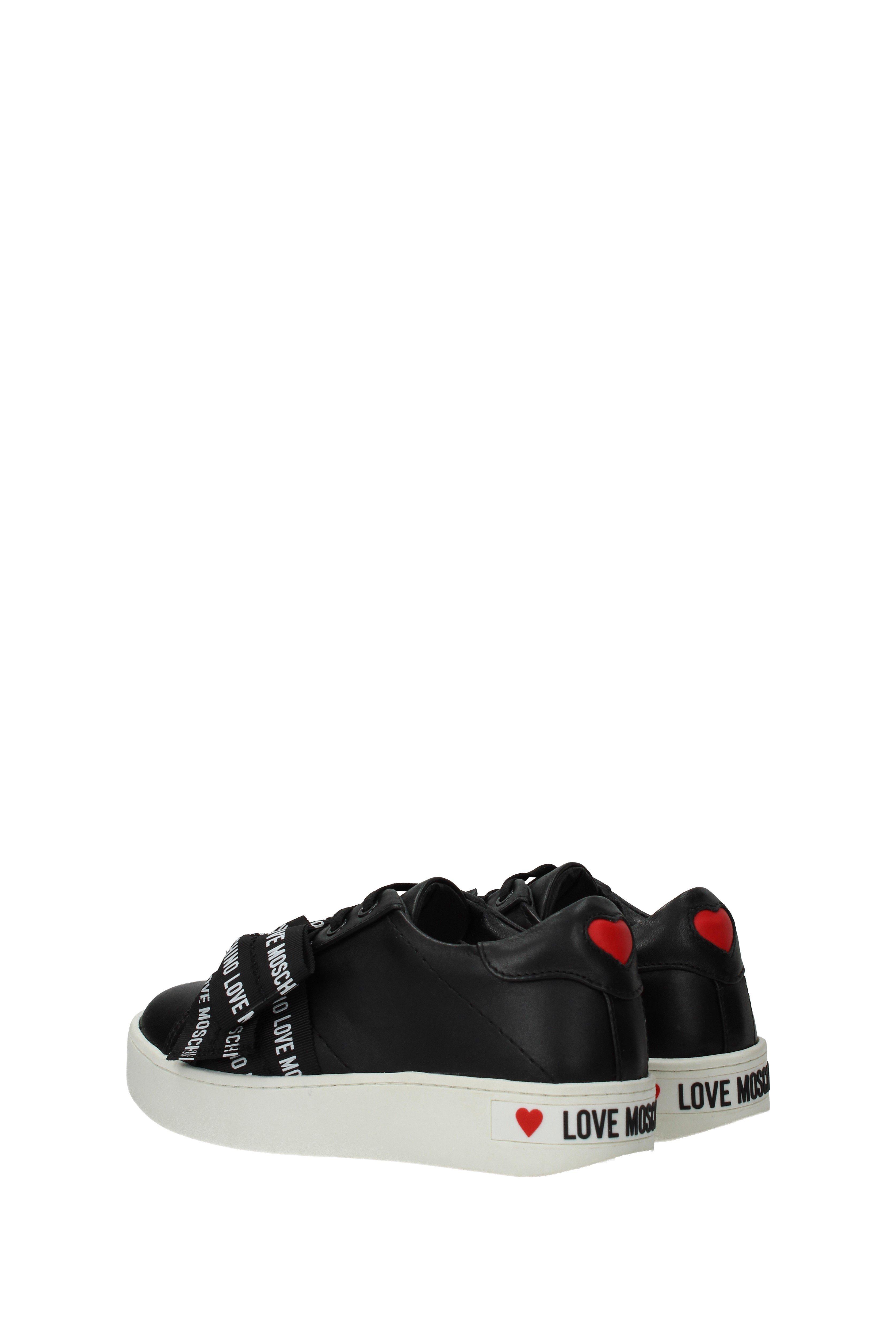 love moschino embellished trainer in black