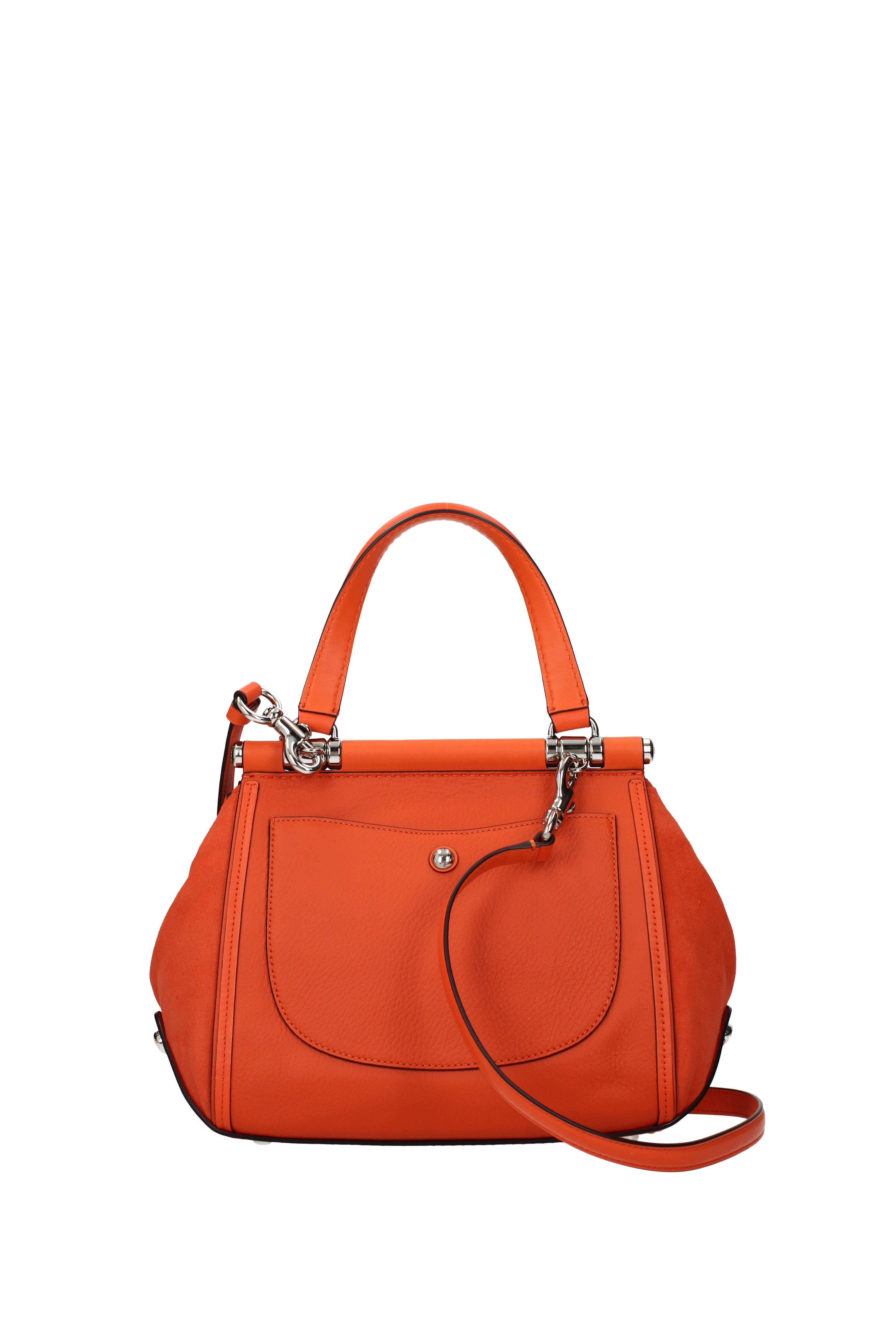 COACH Orange Handbags Lyst