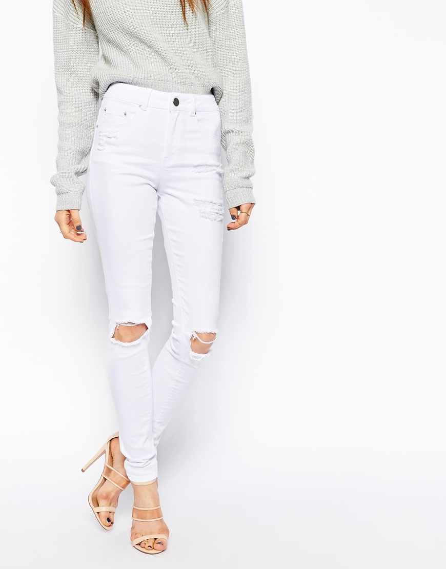 white skinny jeans with rips