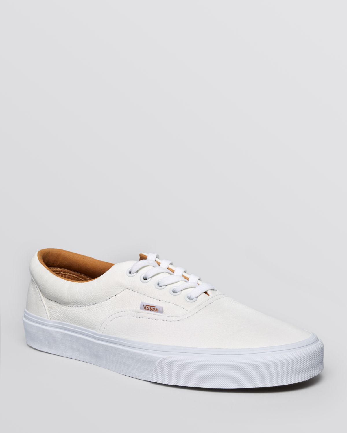 white leather lace up vans