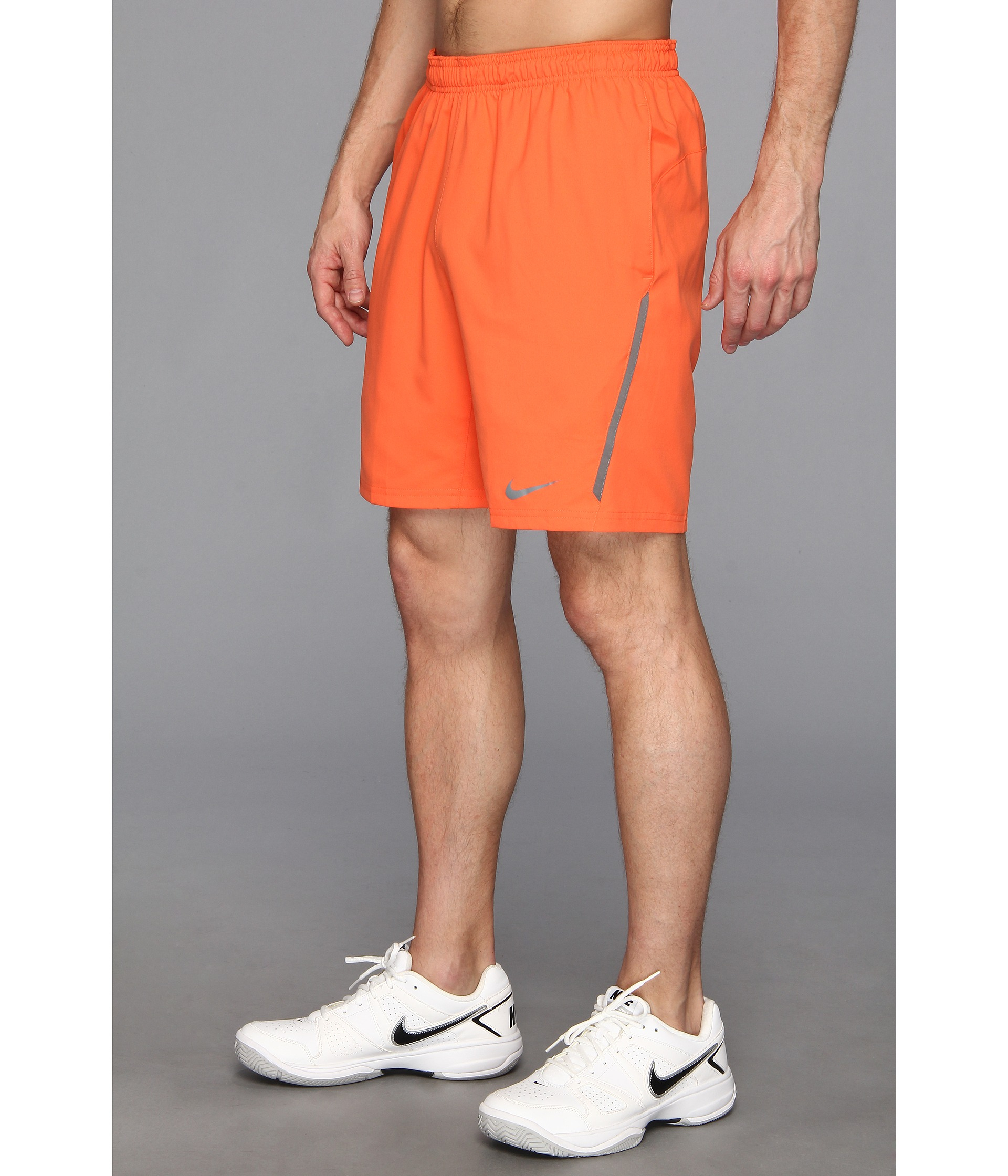 nike woven shorts orange