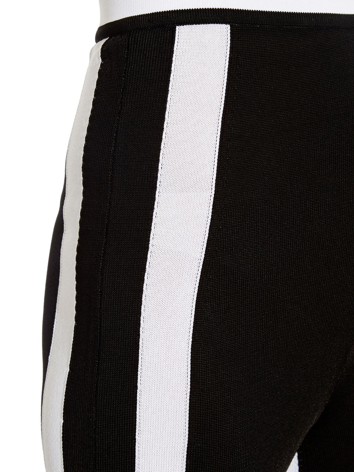 white pants with black side stripe