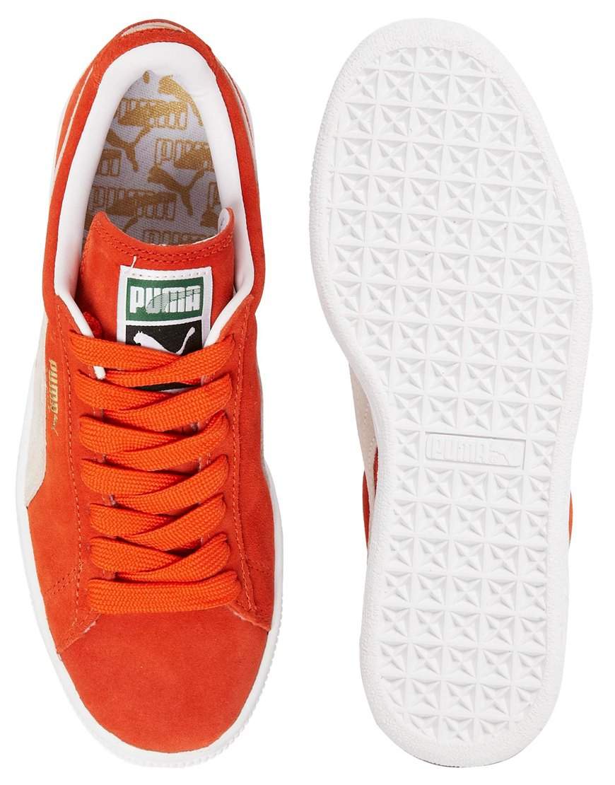 orange puma trainers