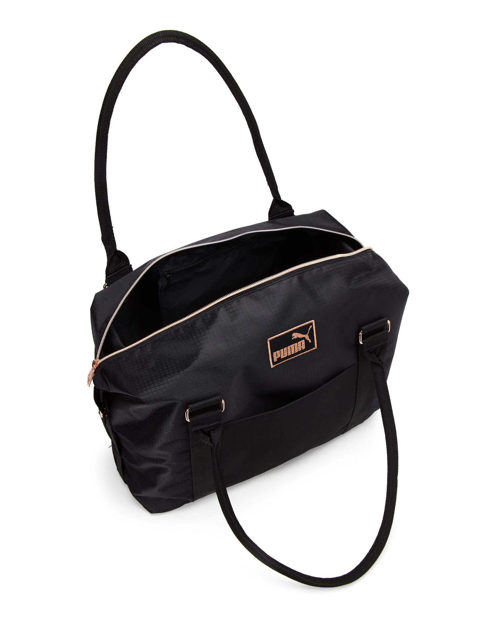 white and gold puma handbag