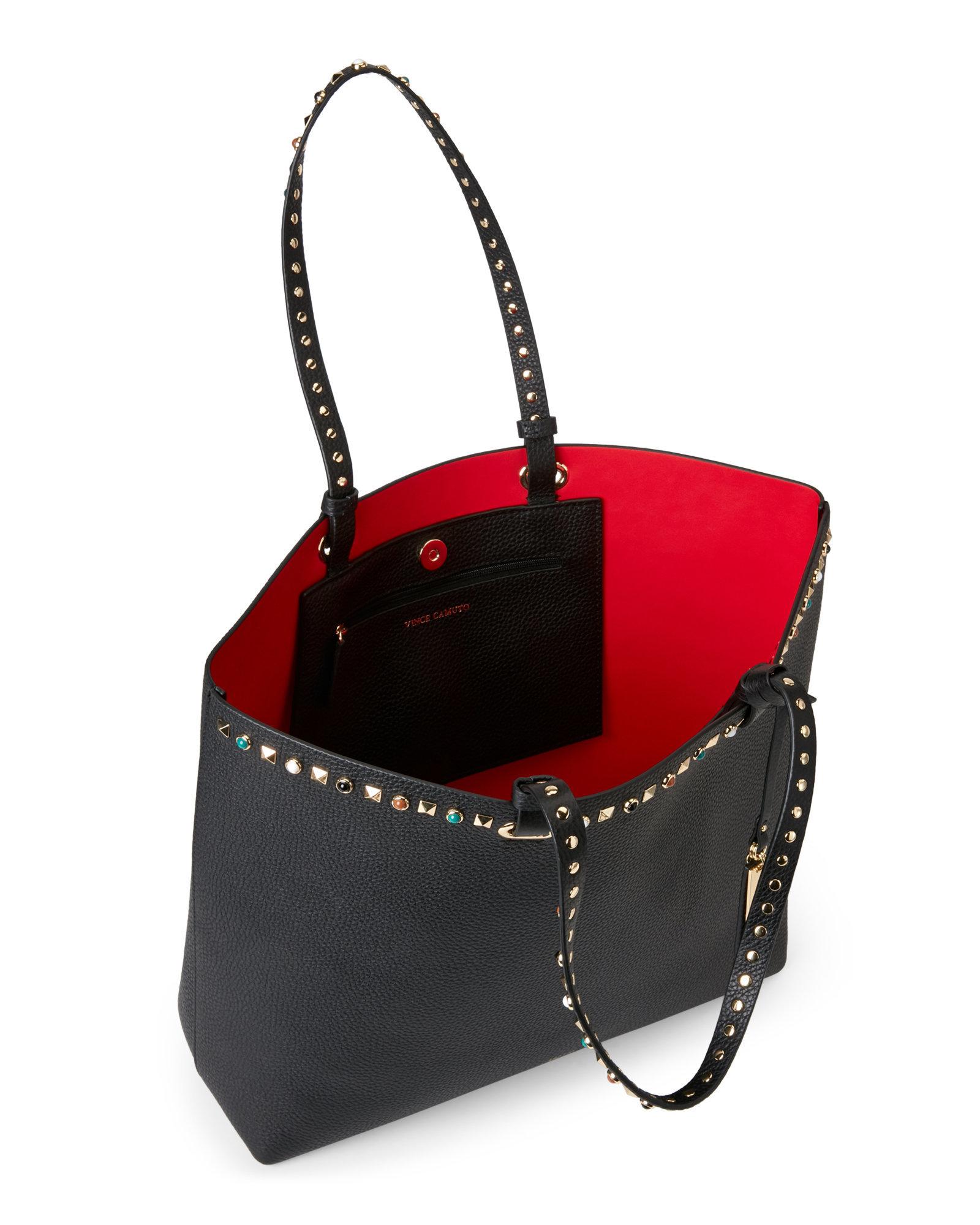 vince camuto studded luggage