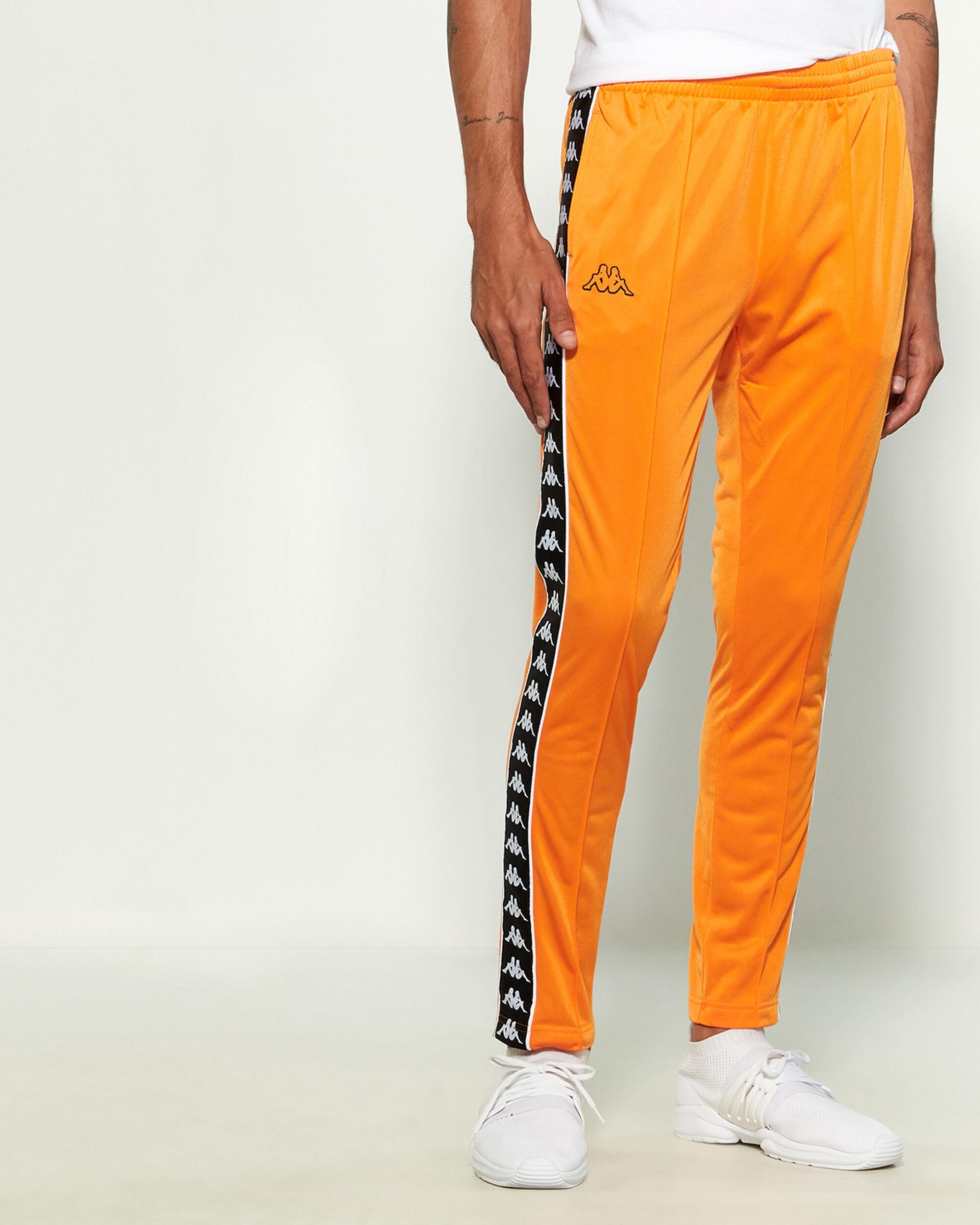 orange and black track pants