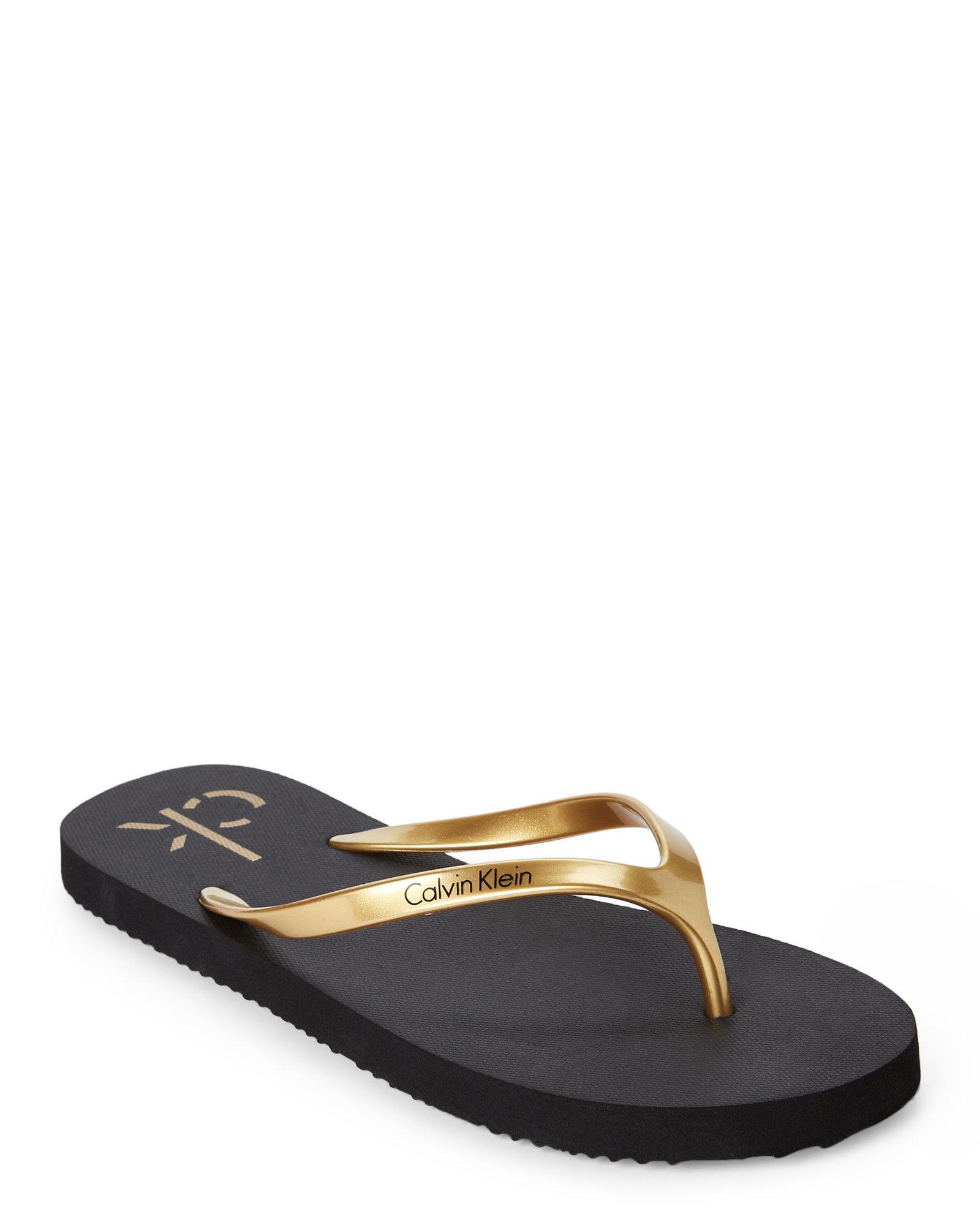 black calvin klein flip flops