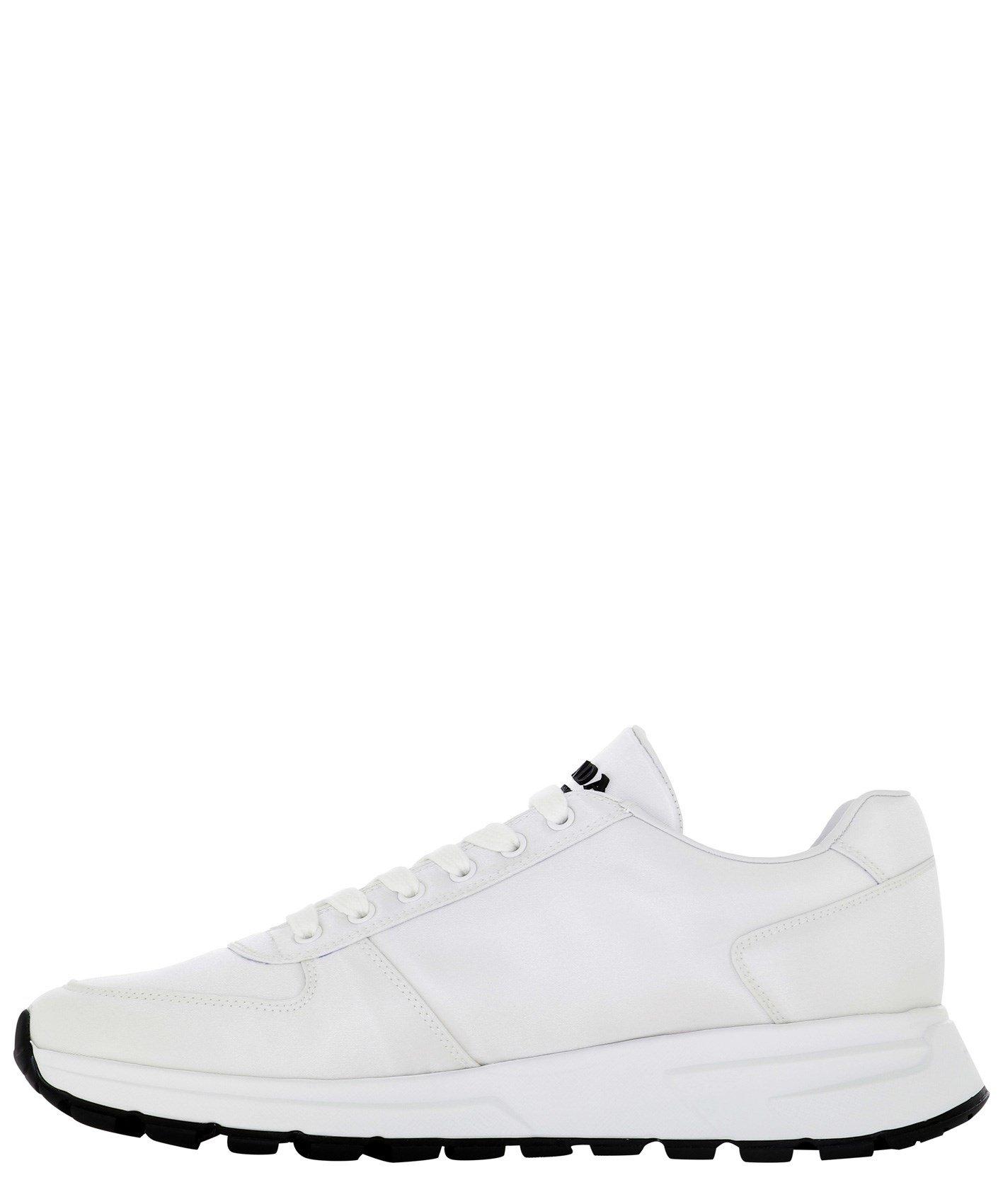 prada logo plaque lace up sneakers