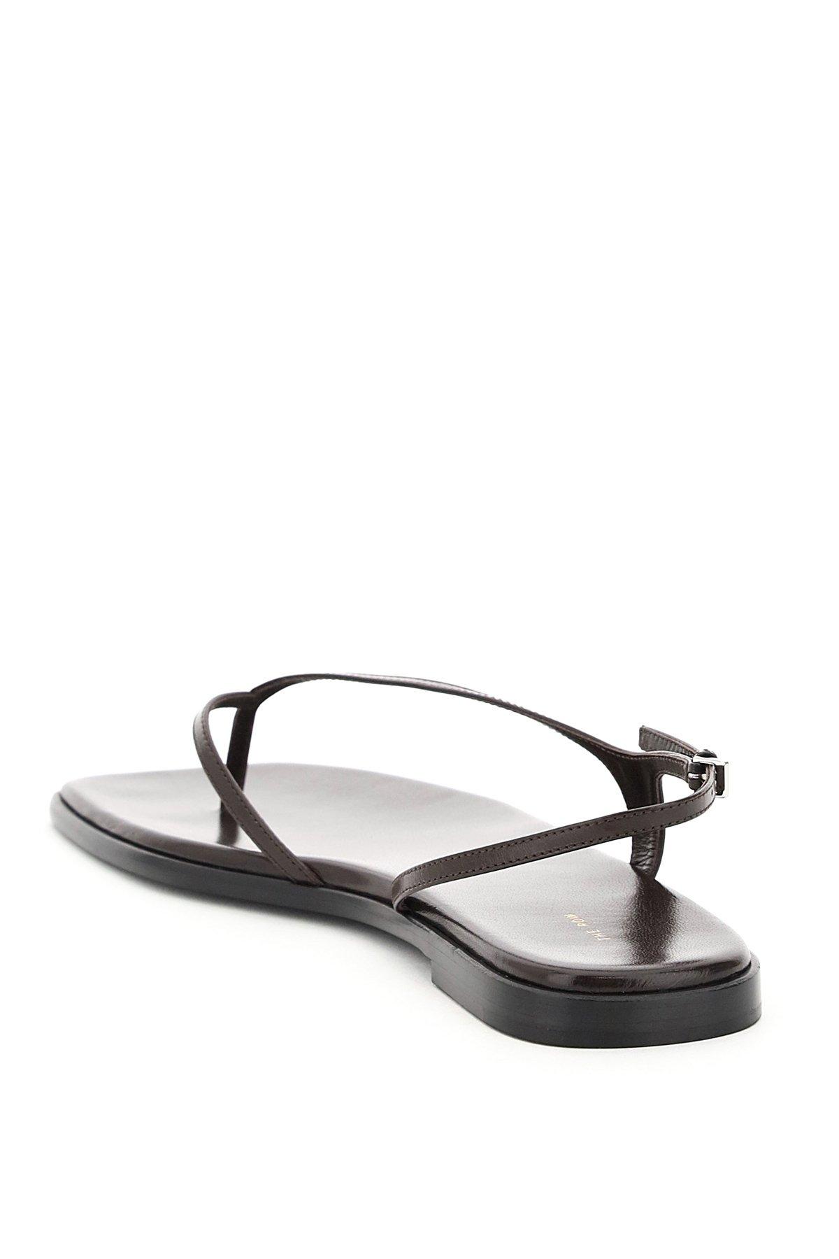 The Row Constance Flat Thong Sandals in Black | Lyst