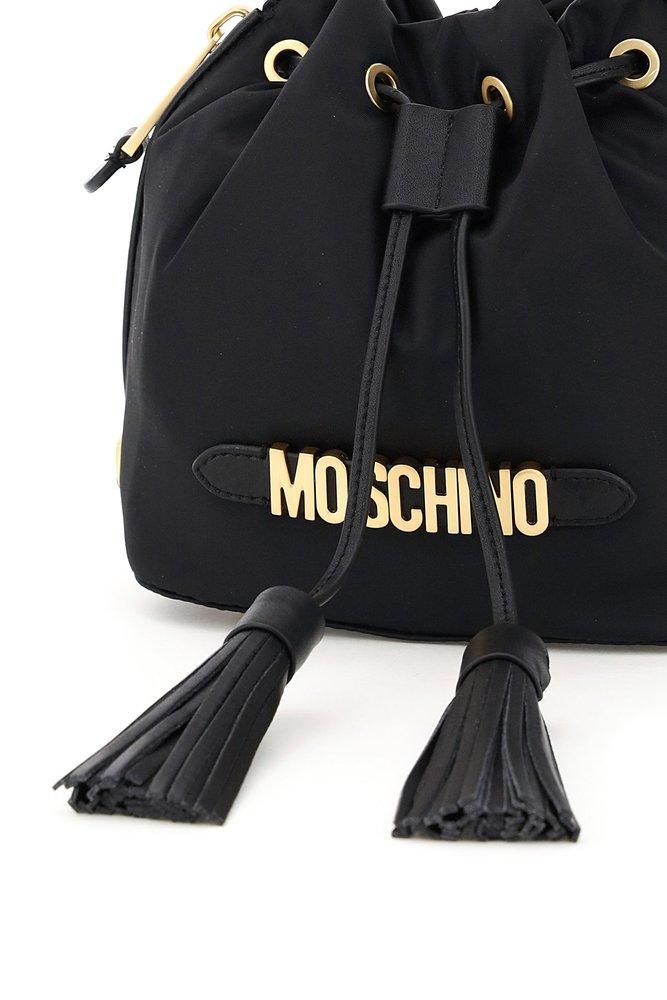 Moschino Logo Plaque Drawstring Bucket Bag in Black | Lyst