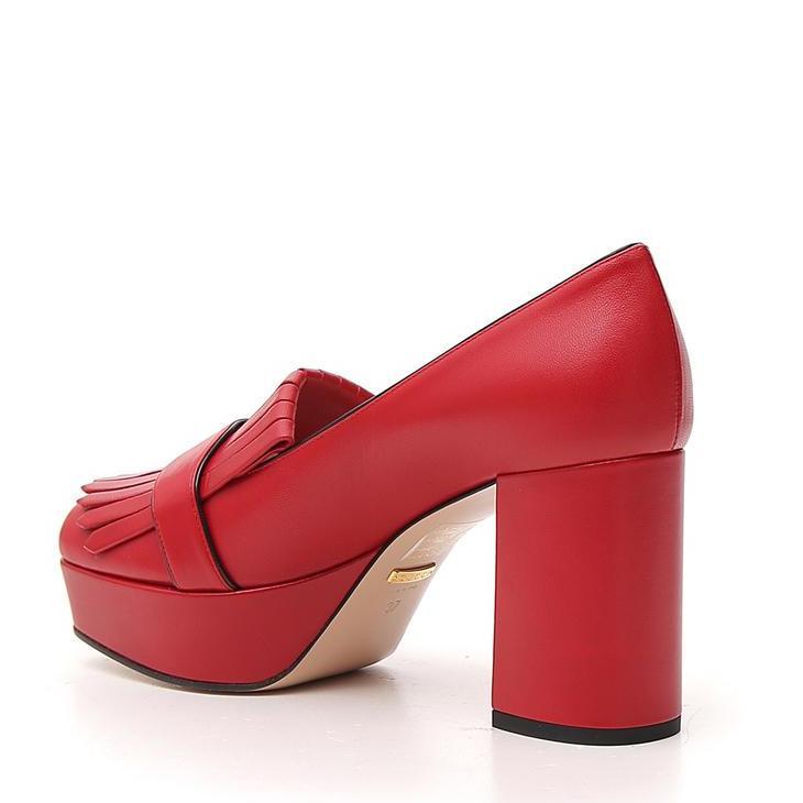 gucci gg fringe leather platform pump