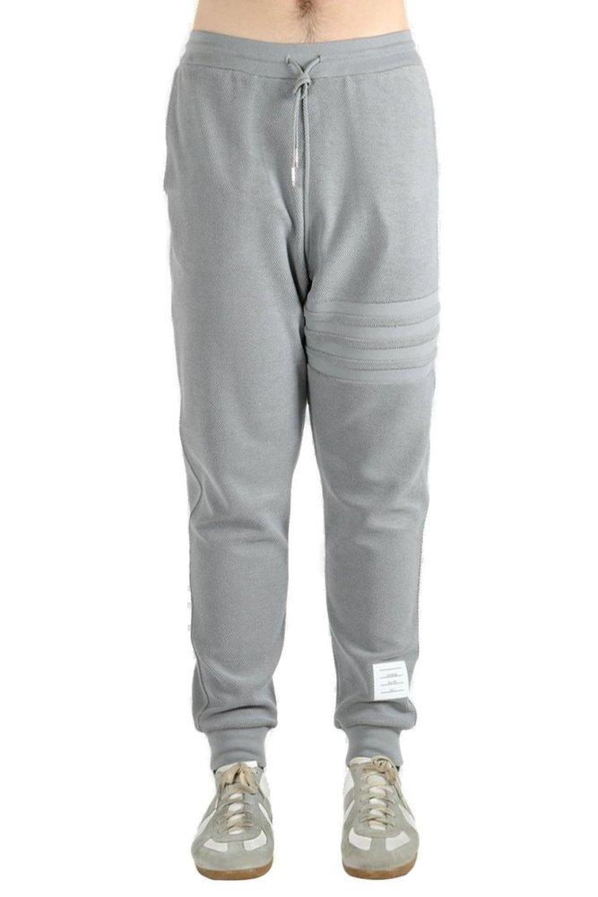 【送料&関税込】Thom Browne 4-bar Drawstring Track Pants Thom Browne 4 Bar Stripe Track Pants | White | FARFETCH