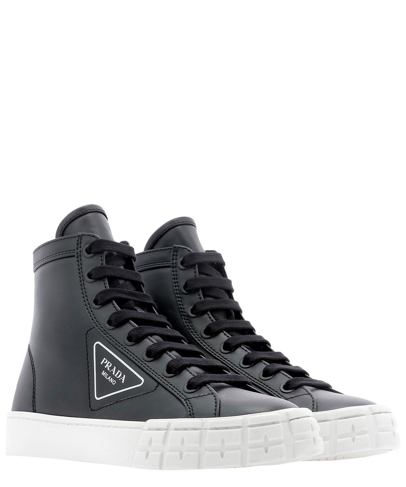 Prada Leather High-top Sneakers in Black - Lyst