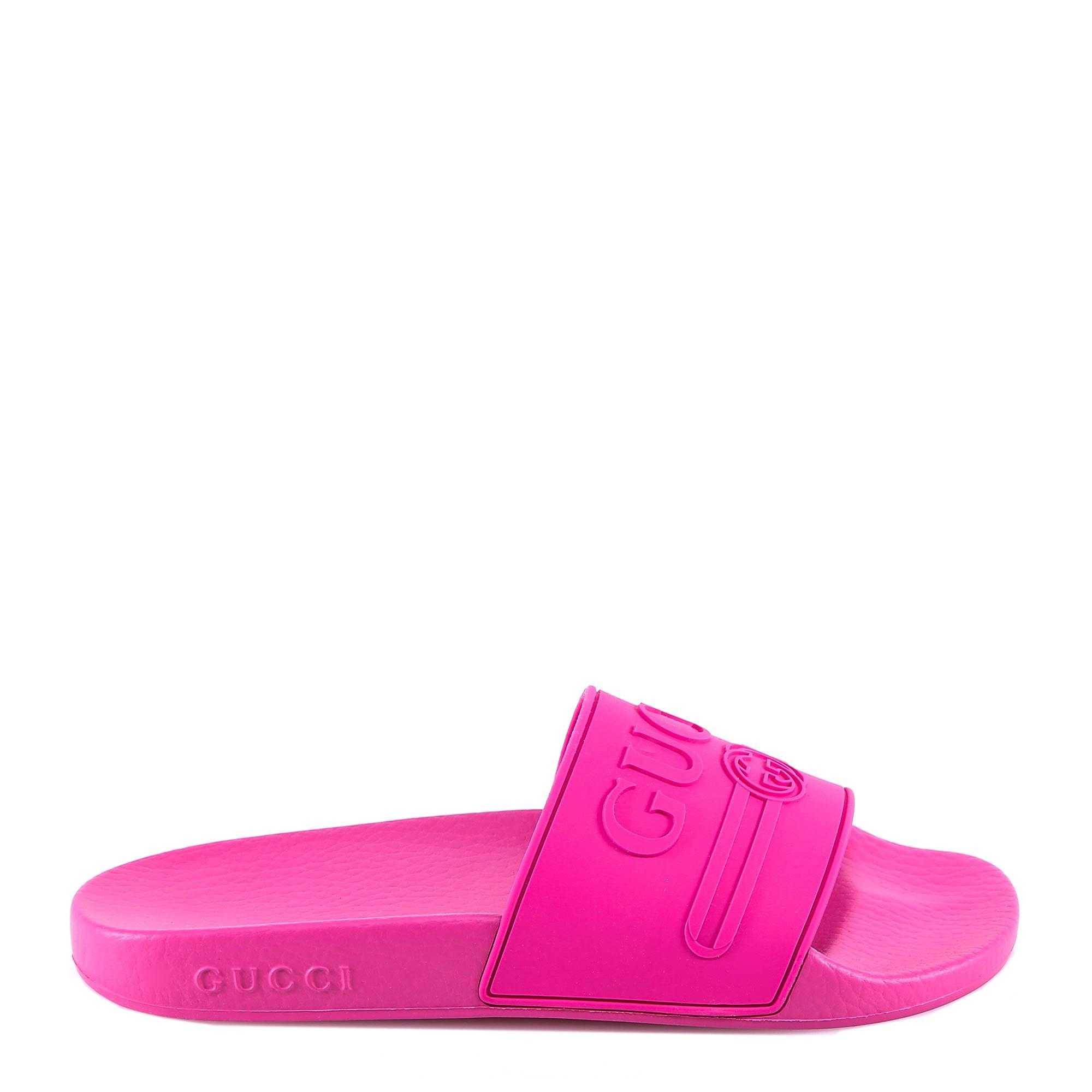 Gucci Rubber Embossed Logo Slides in Pink - Lyst